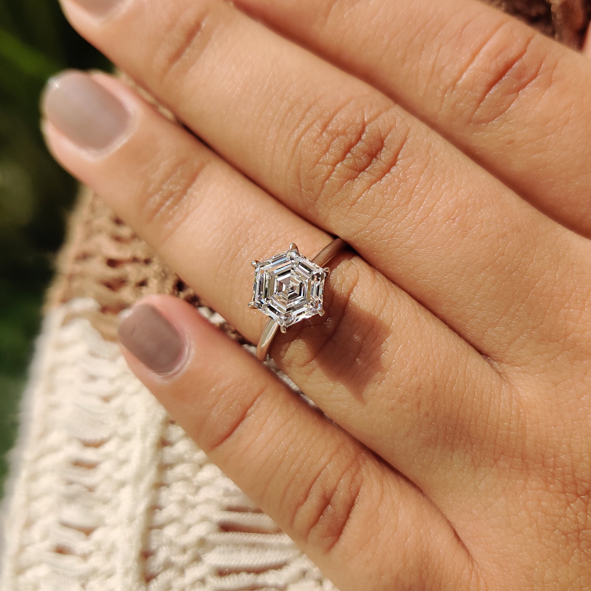 Tulip basket engagement ring with white gold engagement ring.