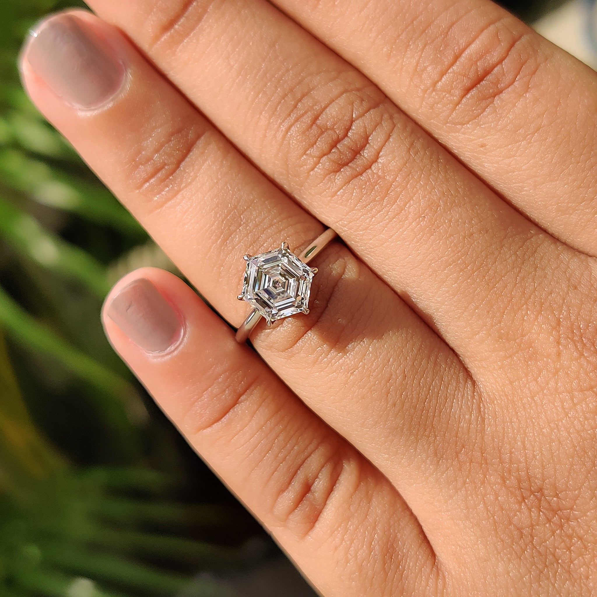 Hexagon engagement ring with tulip basket engagement ring.