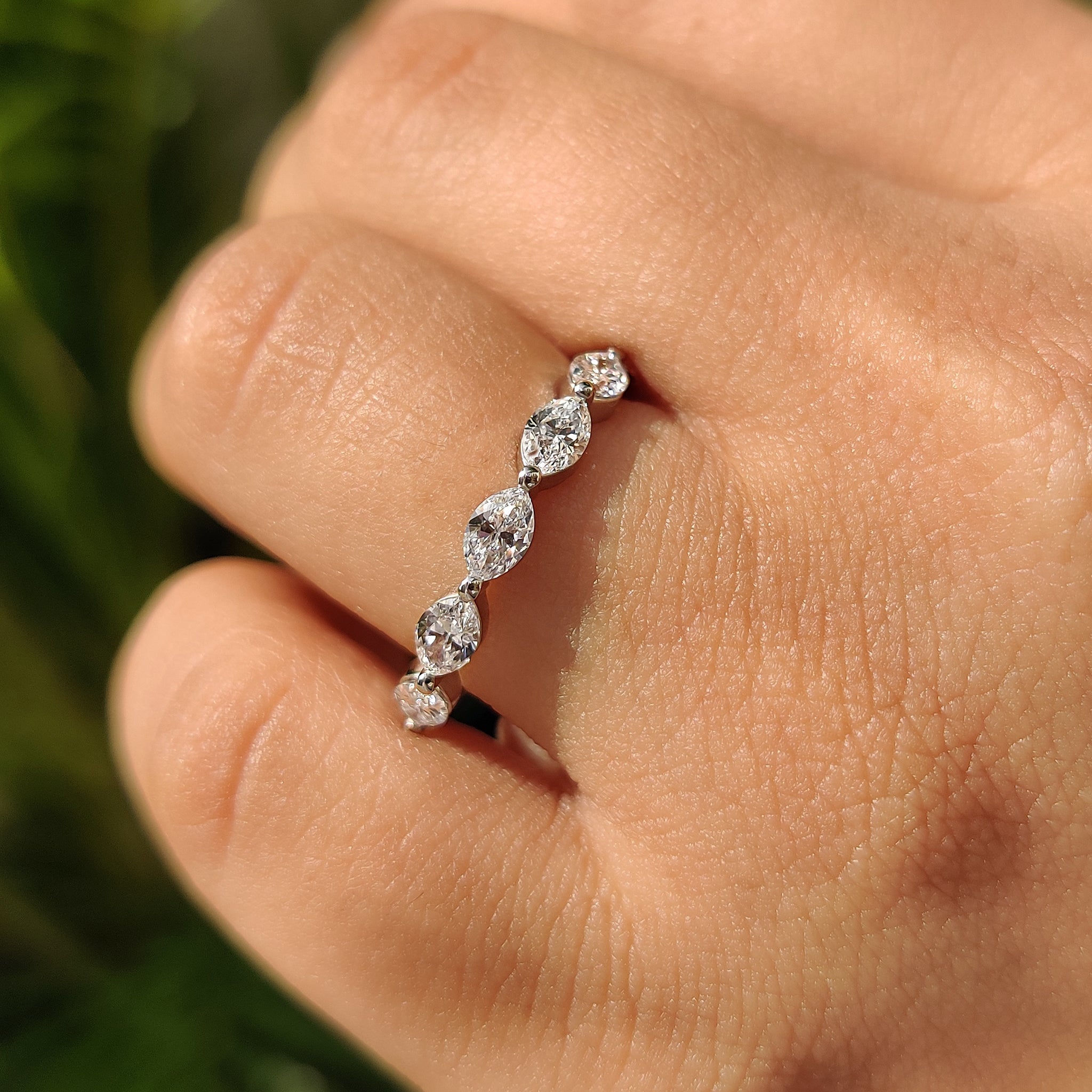 Handmade band with marquise diamonds for weddings.