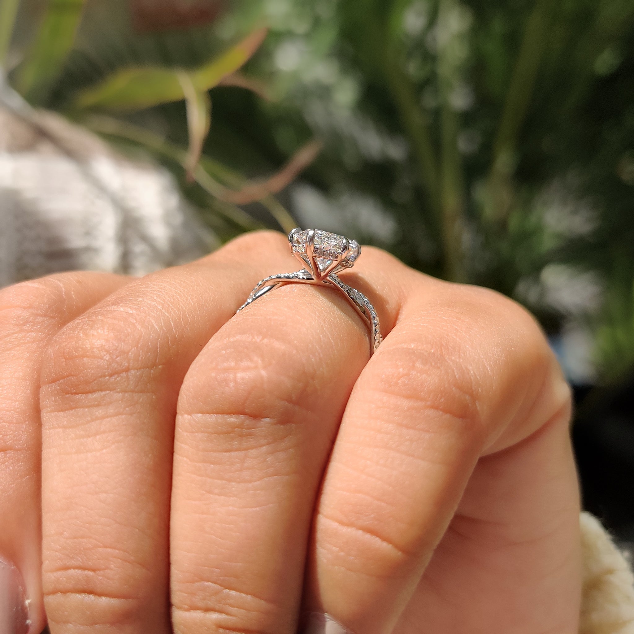 Marquise cut engagement ring with hidden halo engagement ring.
