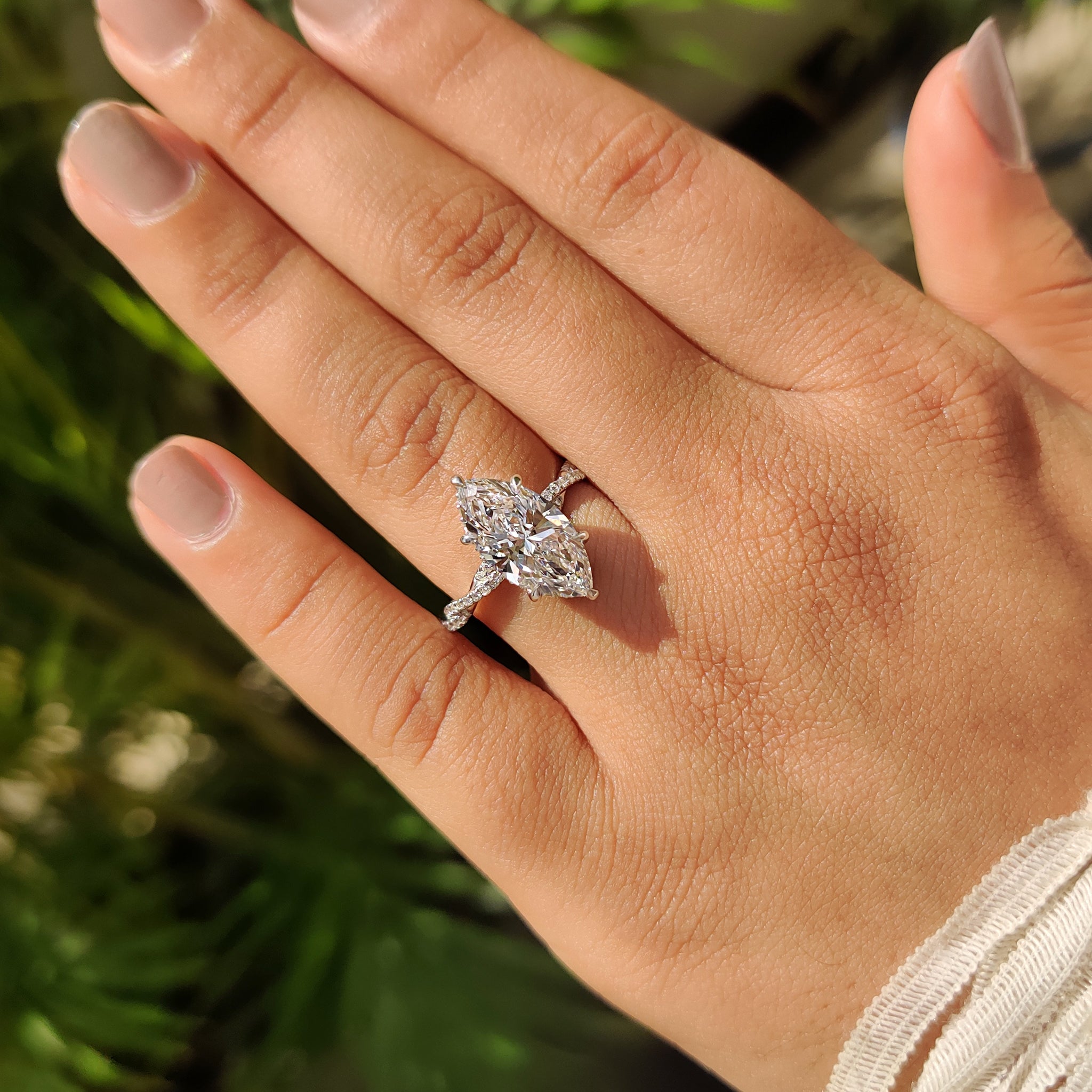 White gold ring with simple engagement ring.