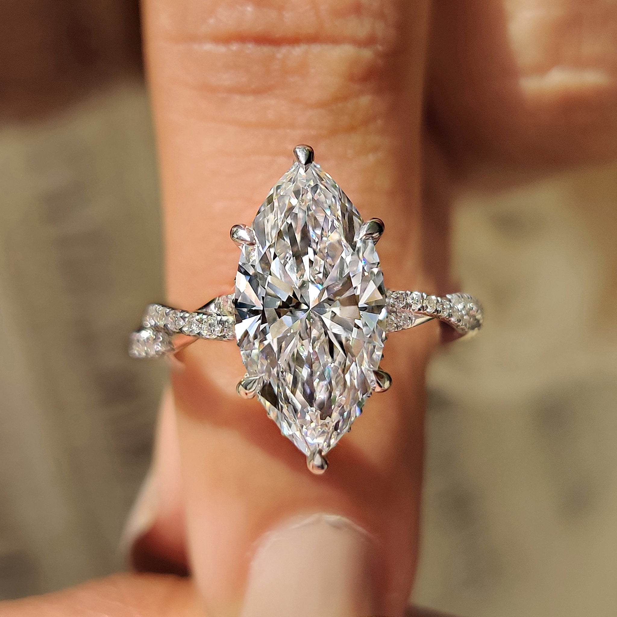 Round cut twisted diamond with white gold ring.