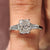 3 stone diamond engagement ring with radiant cut diamond ring.
