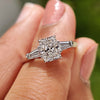 3 stone diamond engagement ring with radiant cut diamond ring.