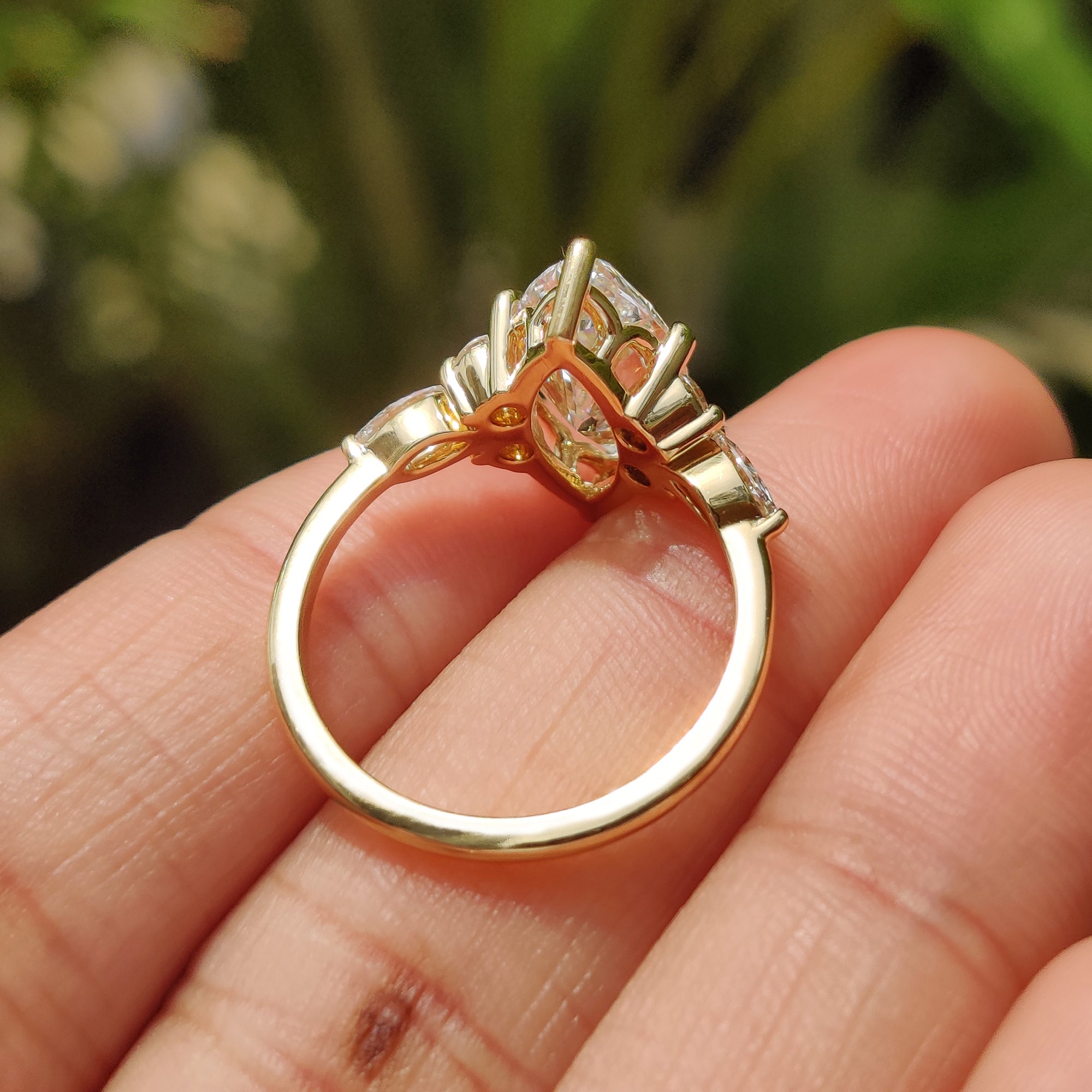 Tapered shank ring with 6 claw prong setting.