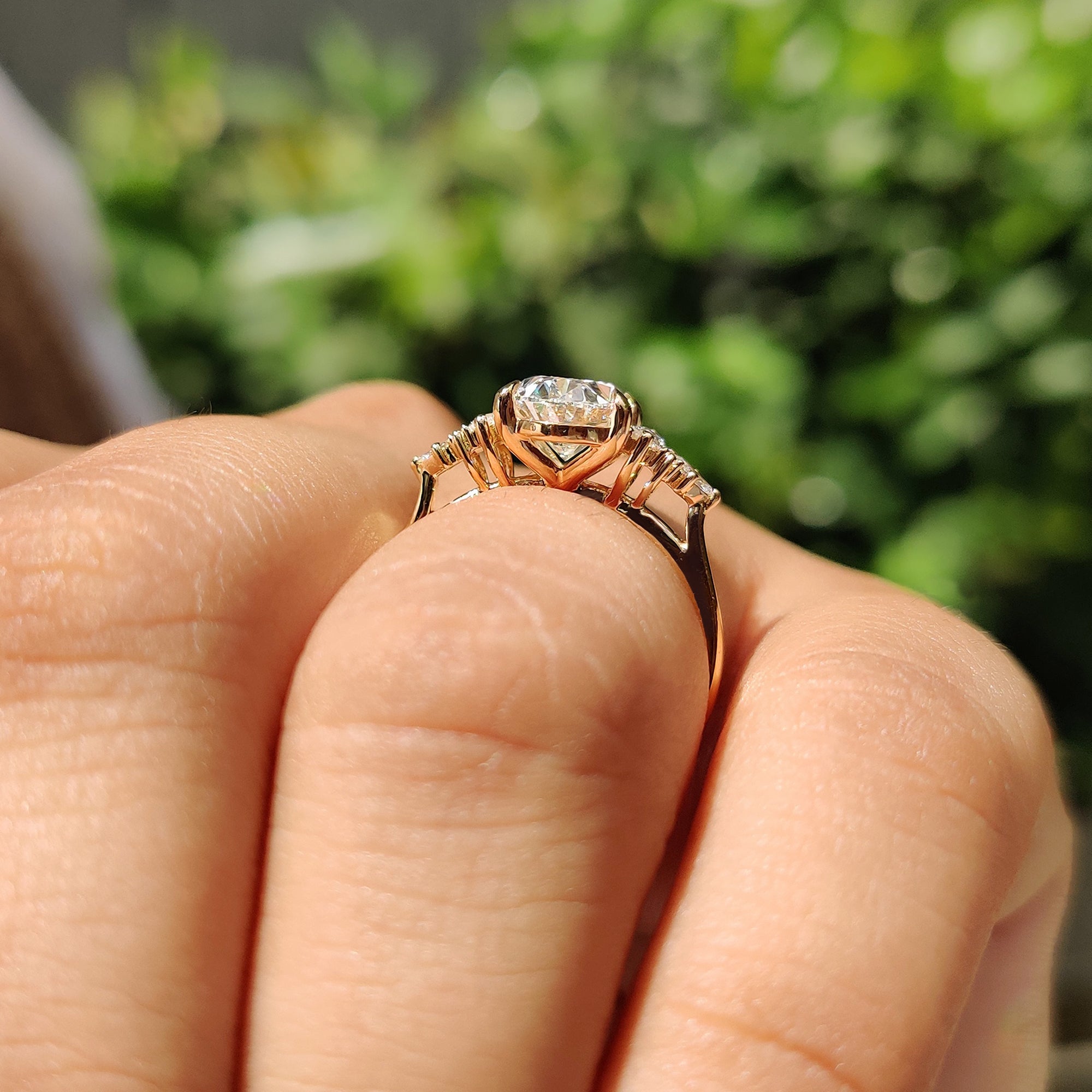 Oval cut engagement ring with muse set ring.