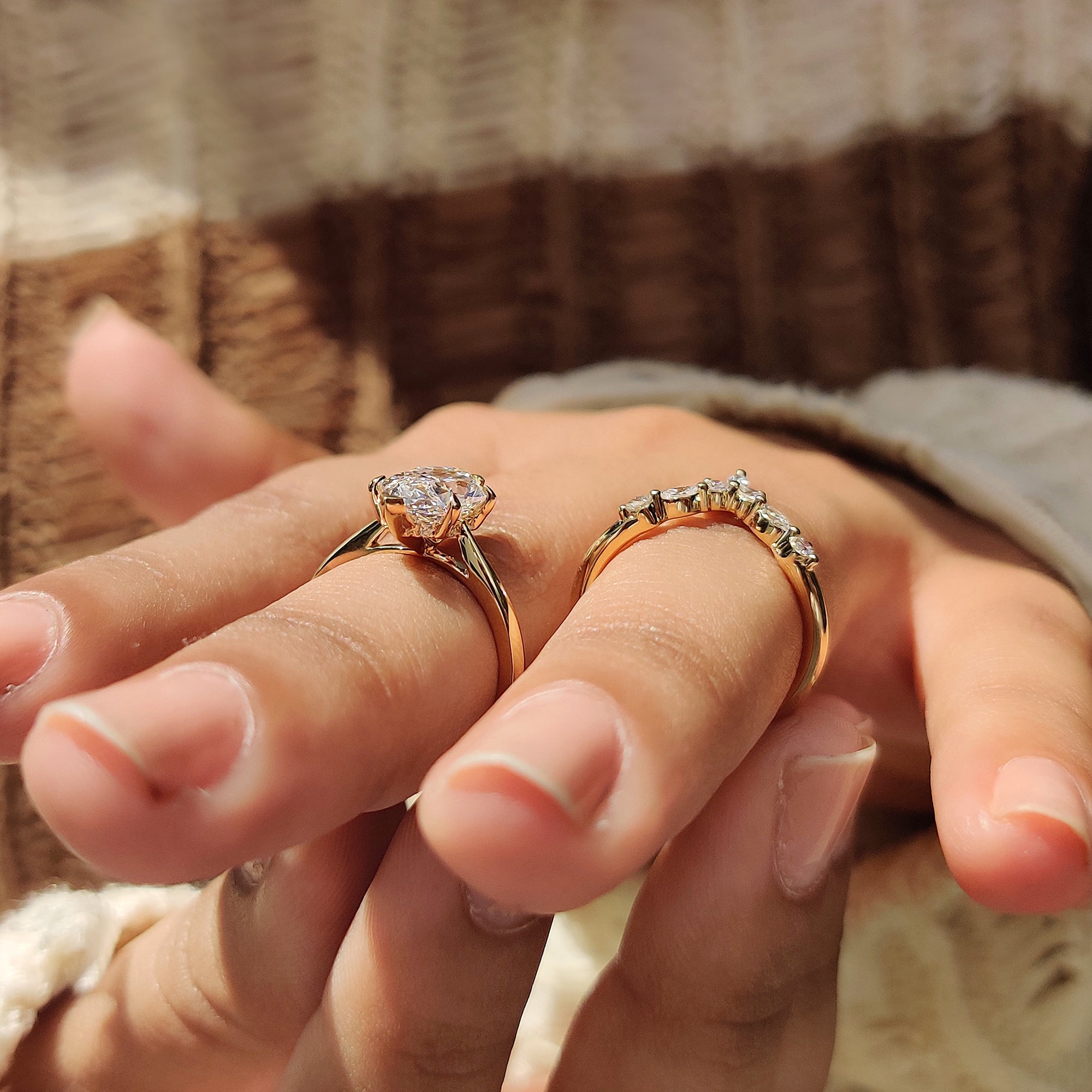 Shared prong setting with v shaped band.