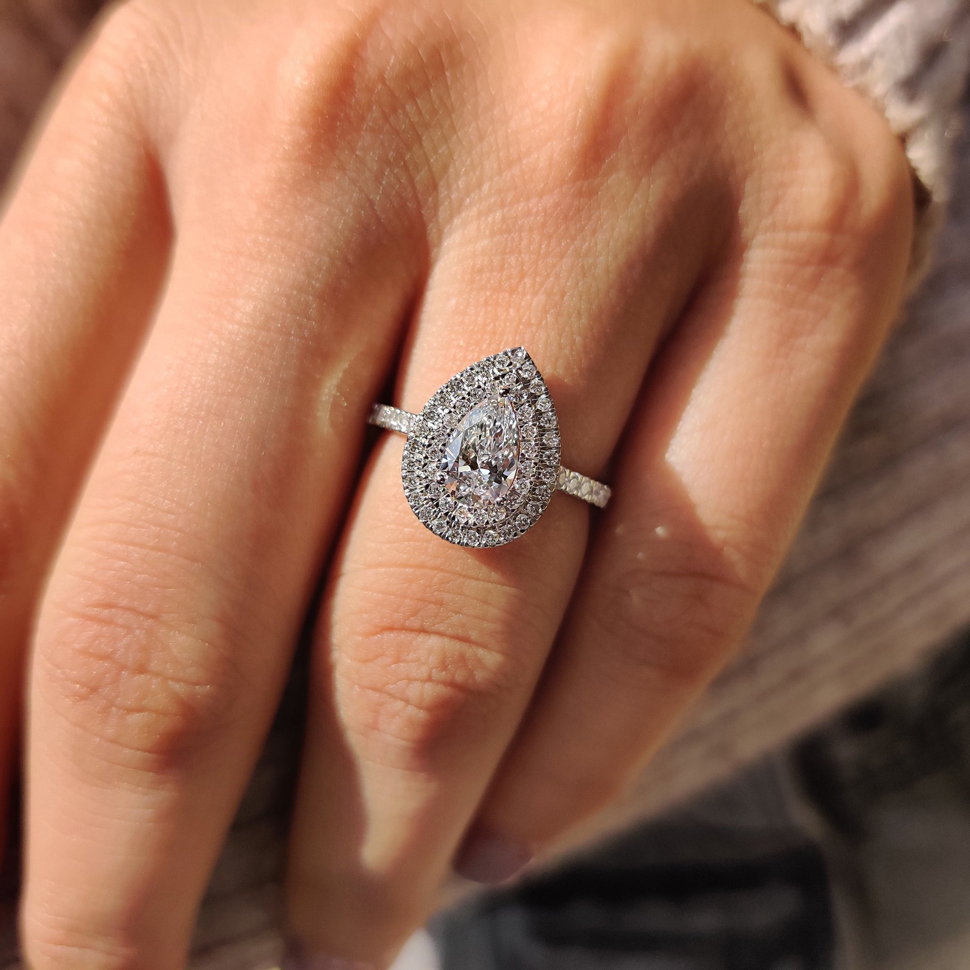 White gold engagement ring with handmade ring.
