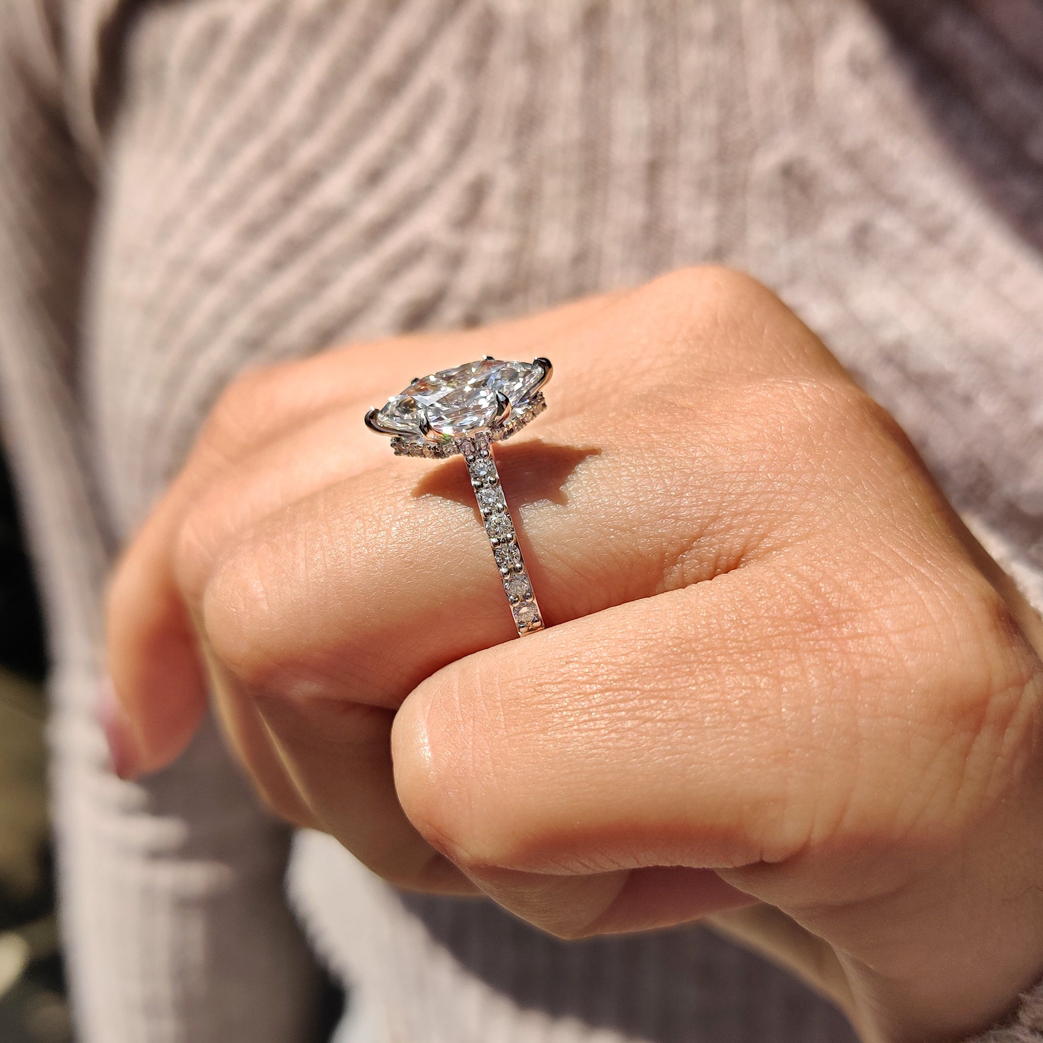 White gold engagement ring with hidden halo diamond ring.
