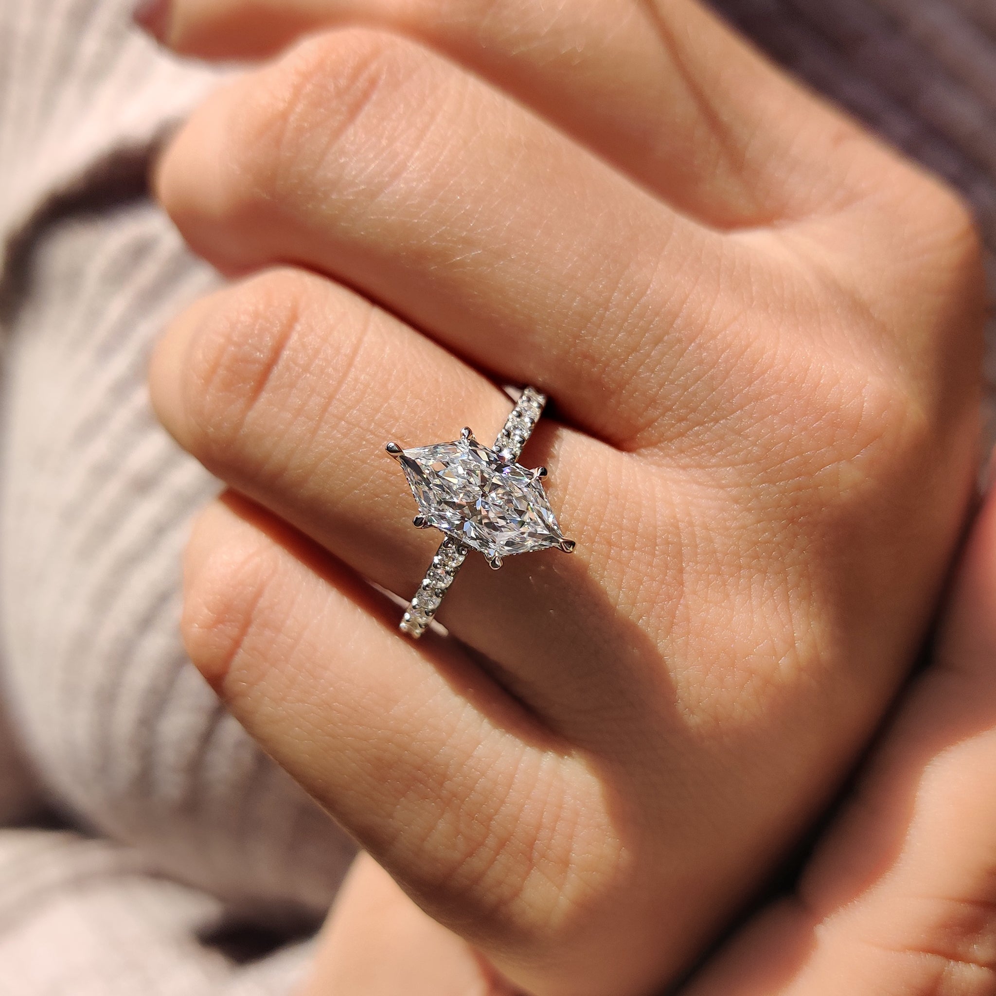 Pave setting ring with white gold engagement ring.
