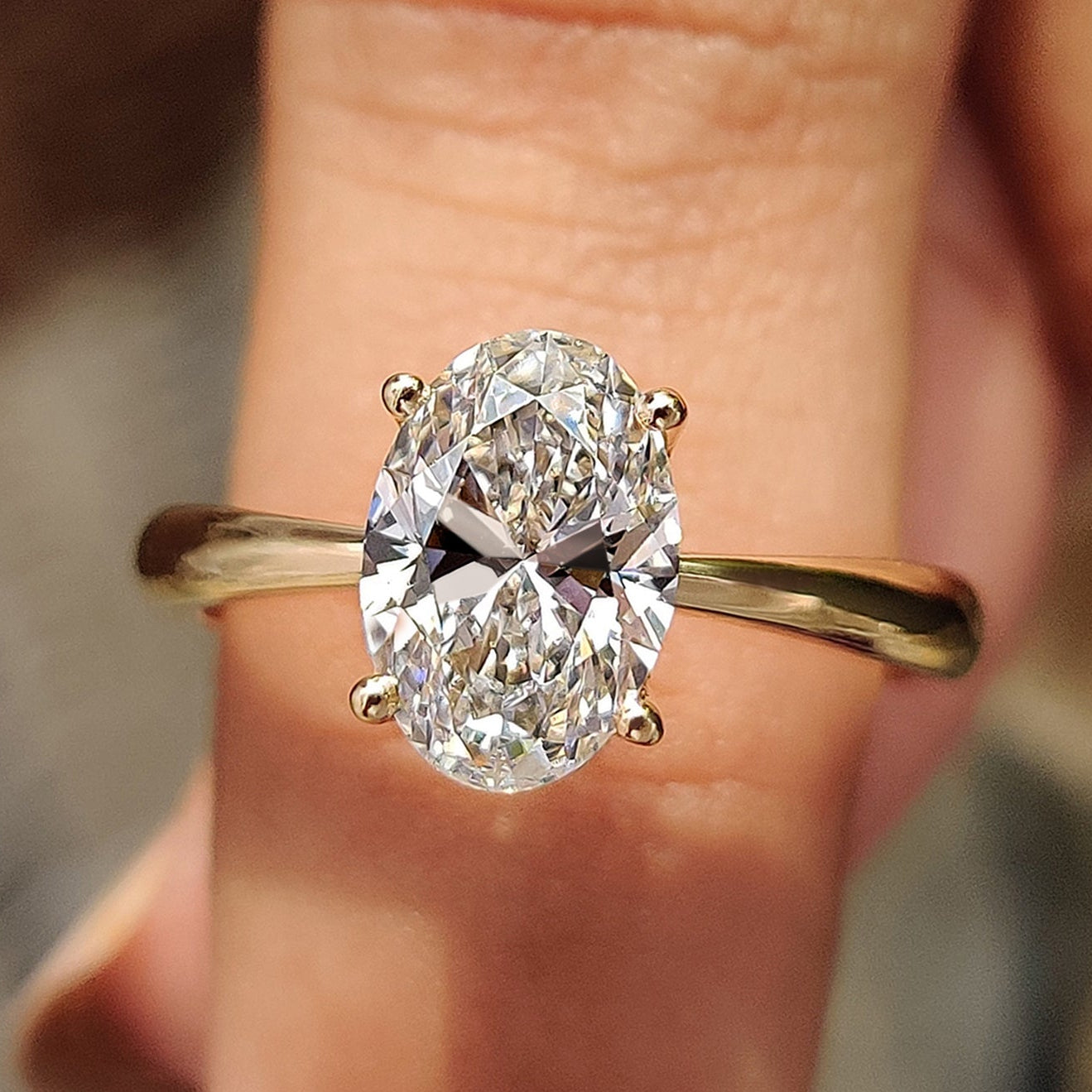 Oval Cut Engagement Ring In Hidden Halo Style