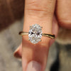 Oval cut engagement ring with solitaire setting ring.
