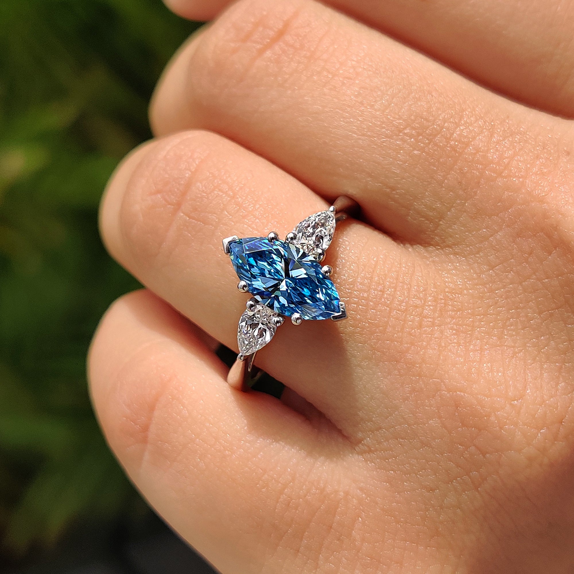 V prong setting with tapered shank ring.