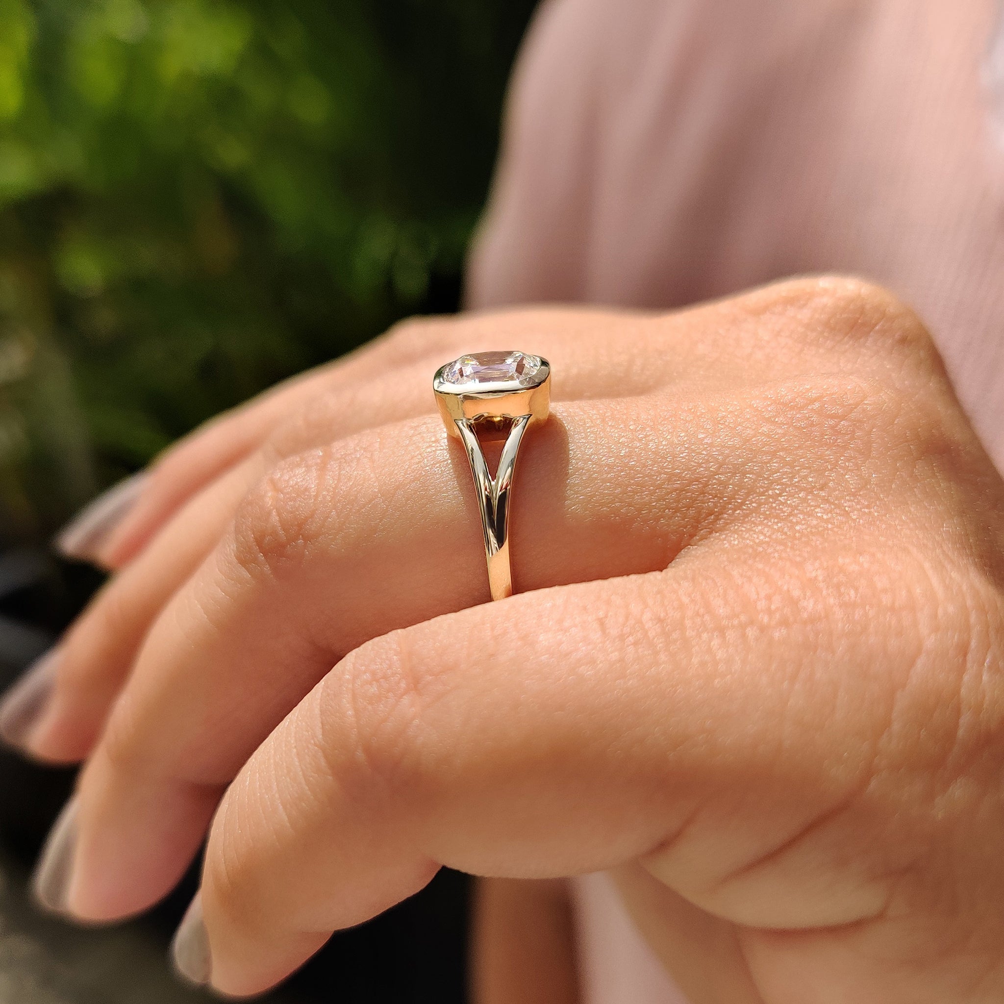 Bezel setting solitaire engagement ring with lab grown old European cut.