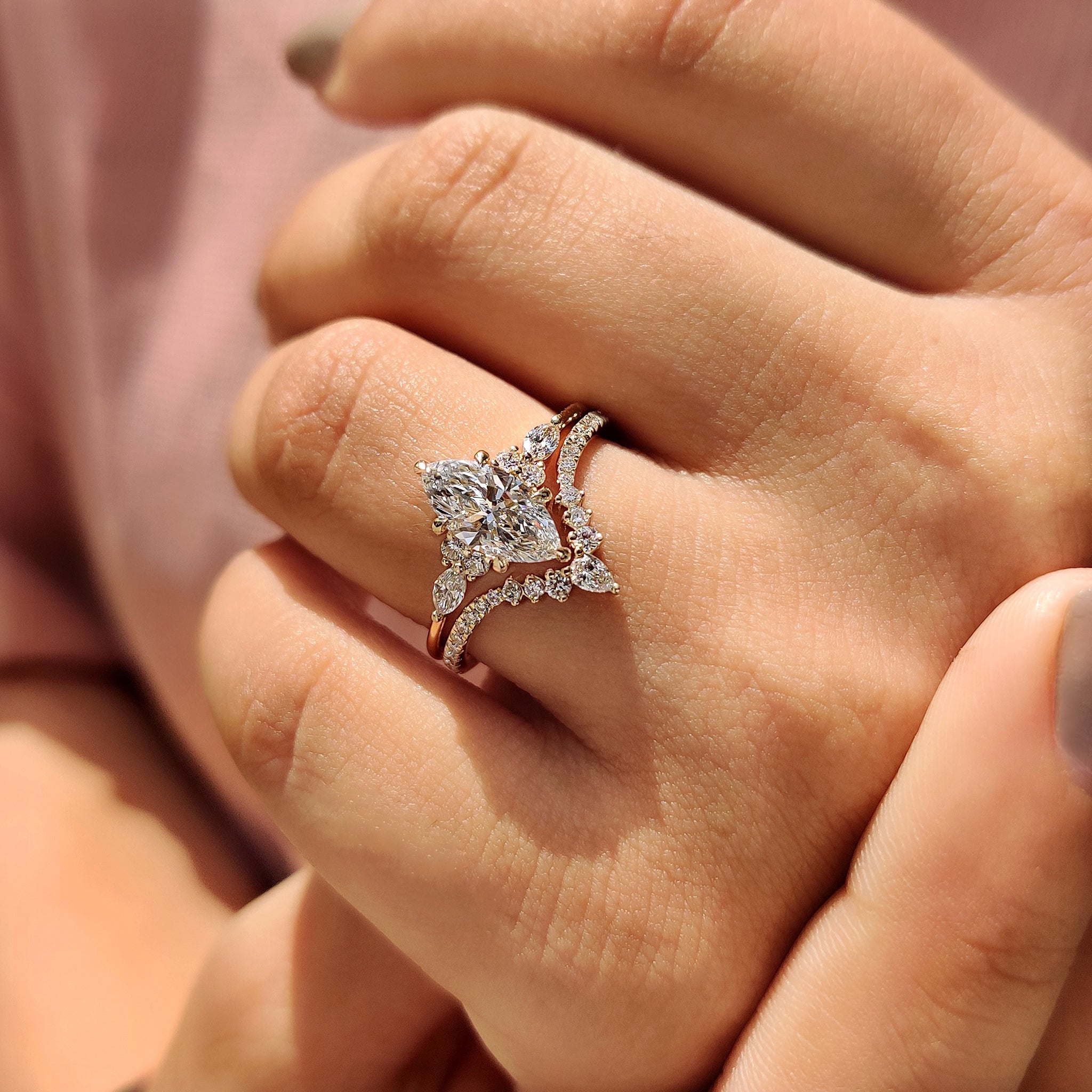 Tapered shank ring with six claw prong in handmade jewelry.