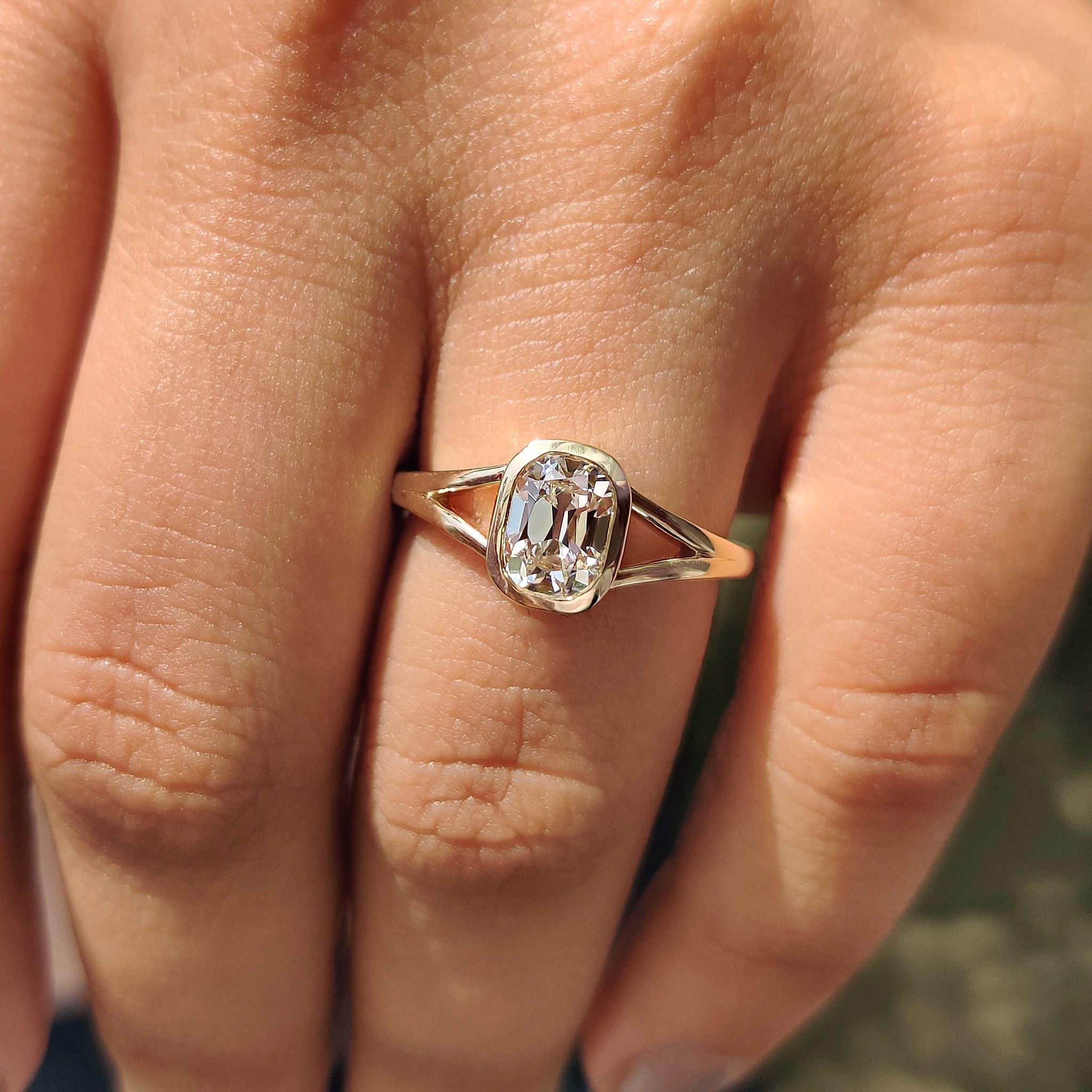 Yellow gold handmade jewelry featuring cushion cut old European diamond.