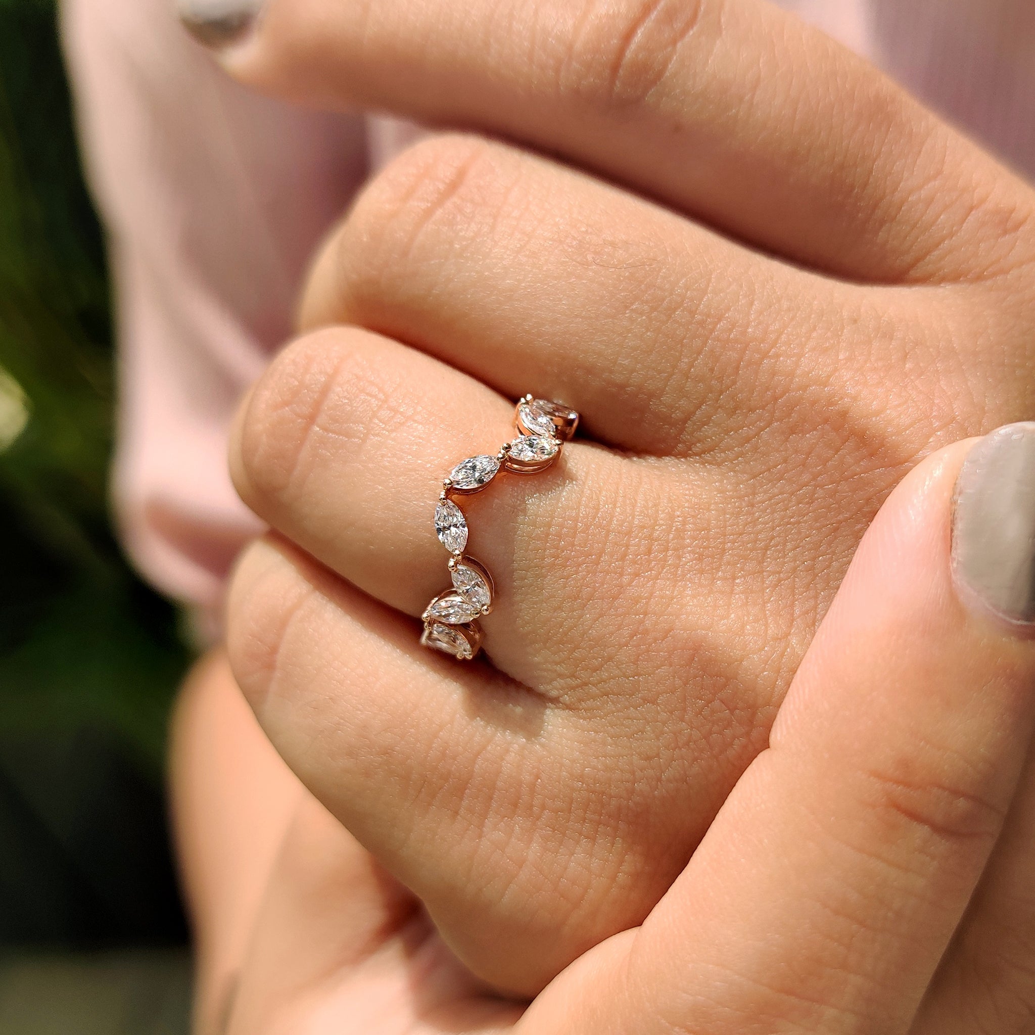 Marquise diamond wedding band in rose gold wedding band.