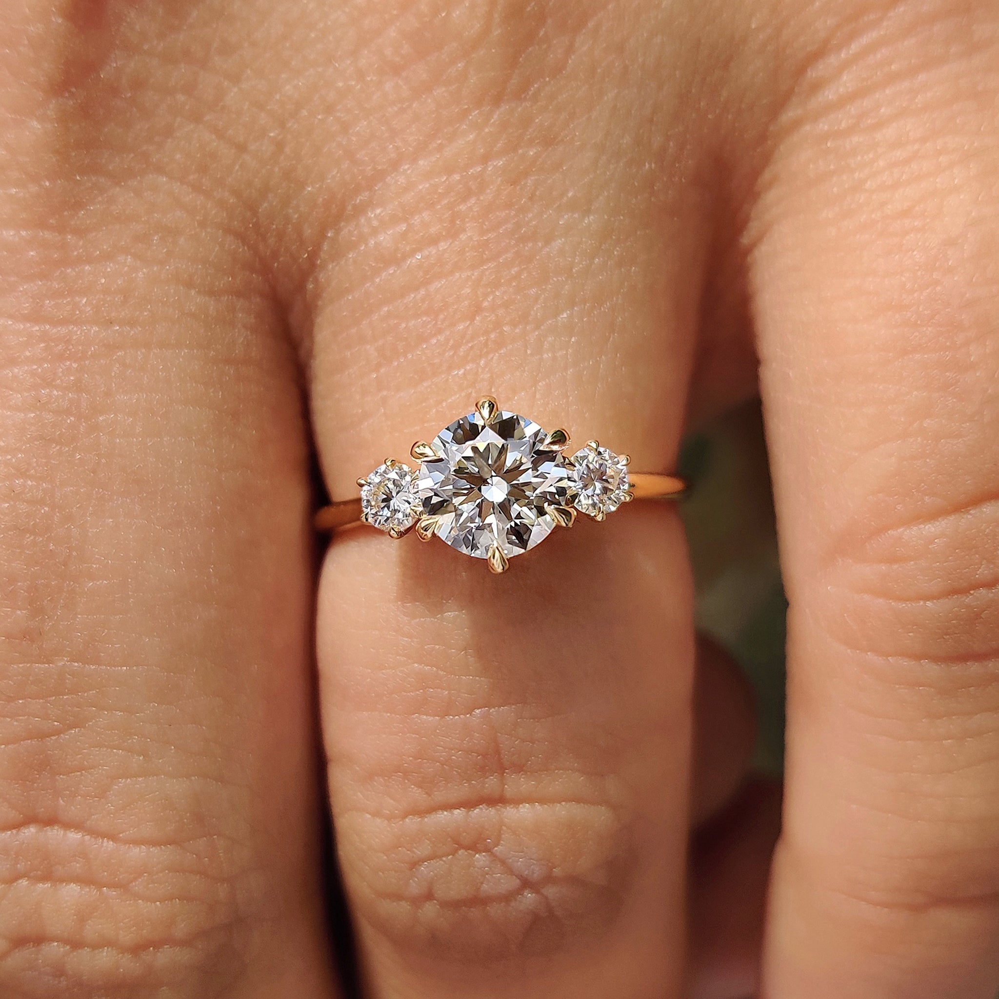 Round Cut Diamond Ring In 3 Stone Style