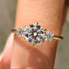 Three stone diamond engagement ring with round cut engagement ring.
