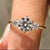 Three stone diamond engagement ring with round cut engagement ring.
