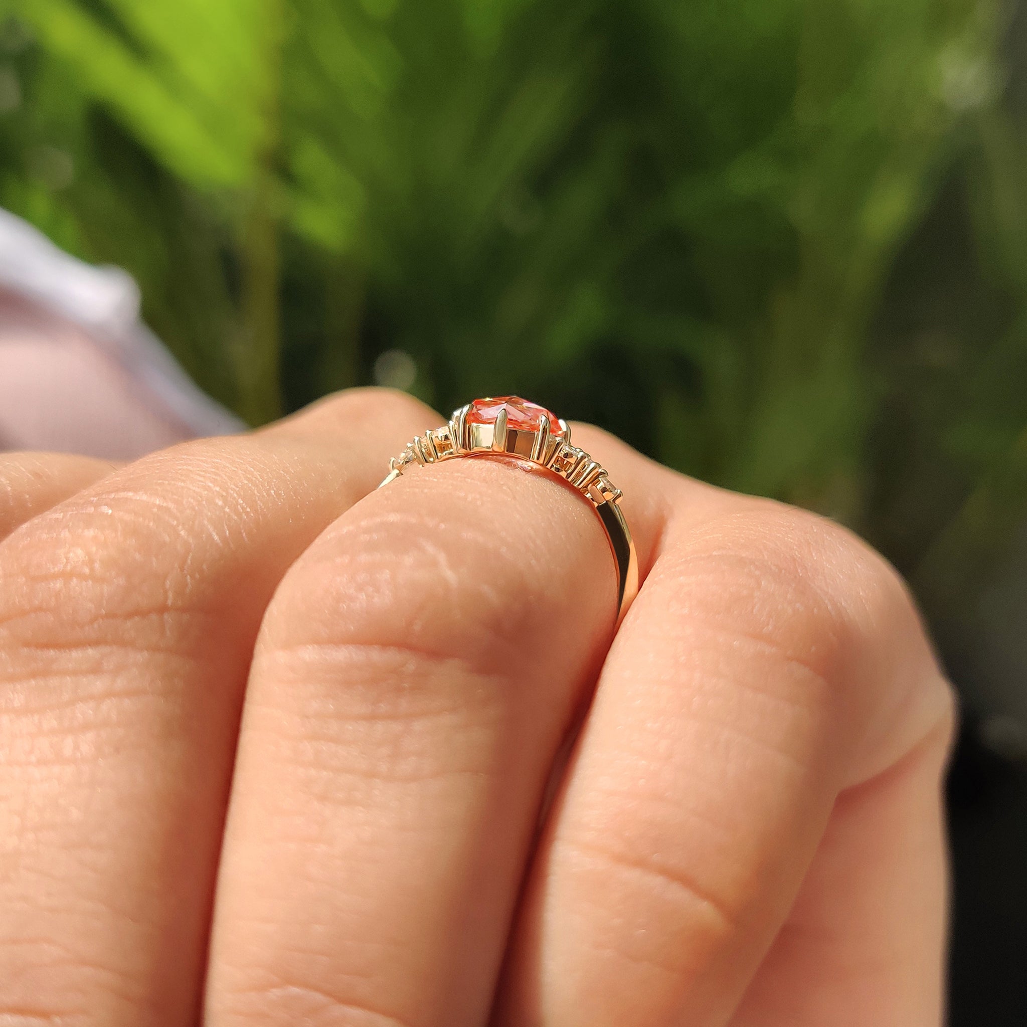 Yellow gold diamond ring with tapered shank ring.