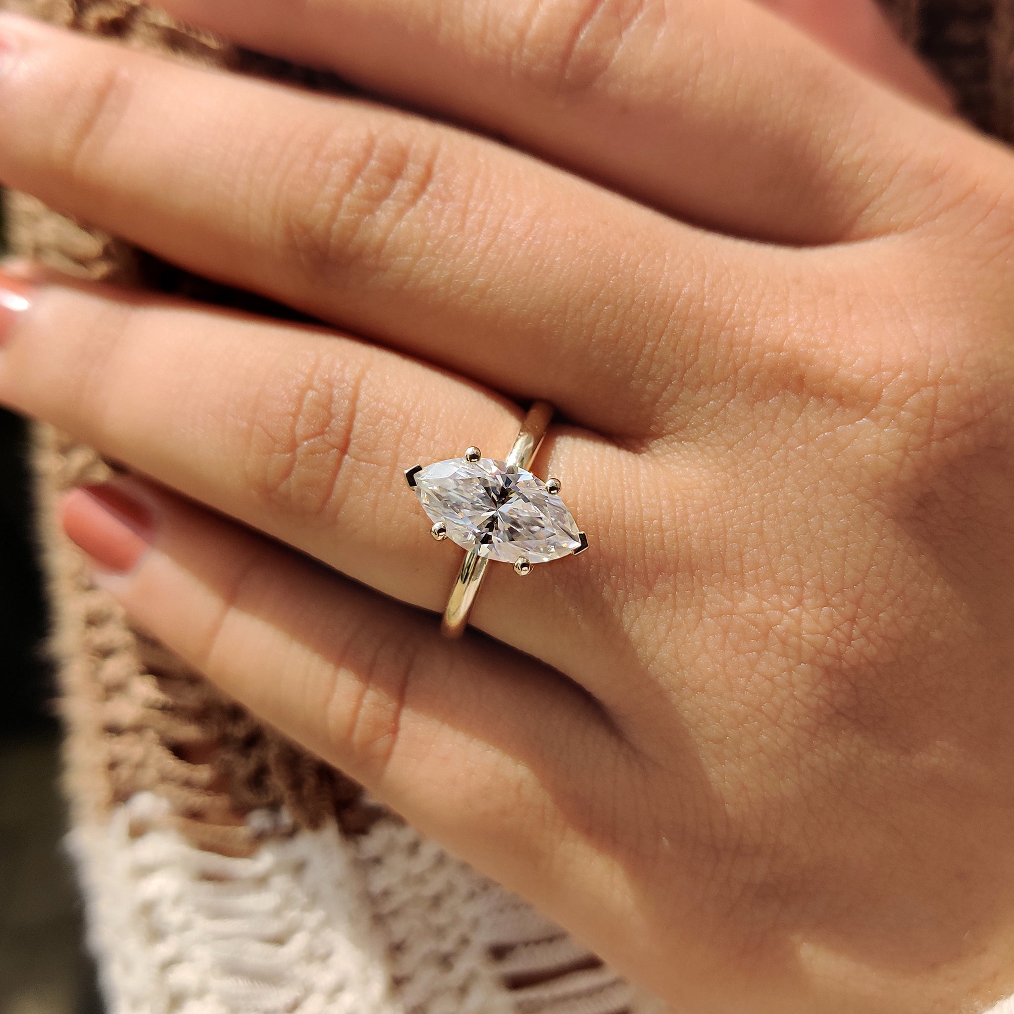 V prong setting with 4 prong ring.