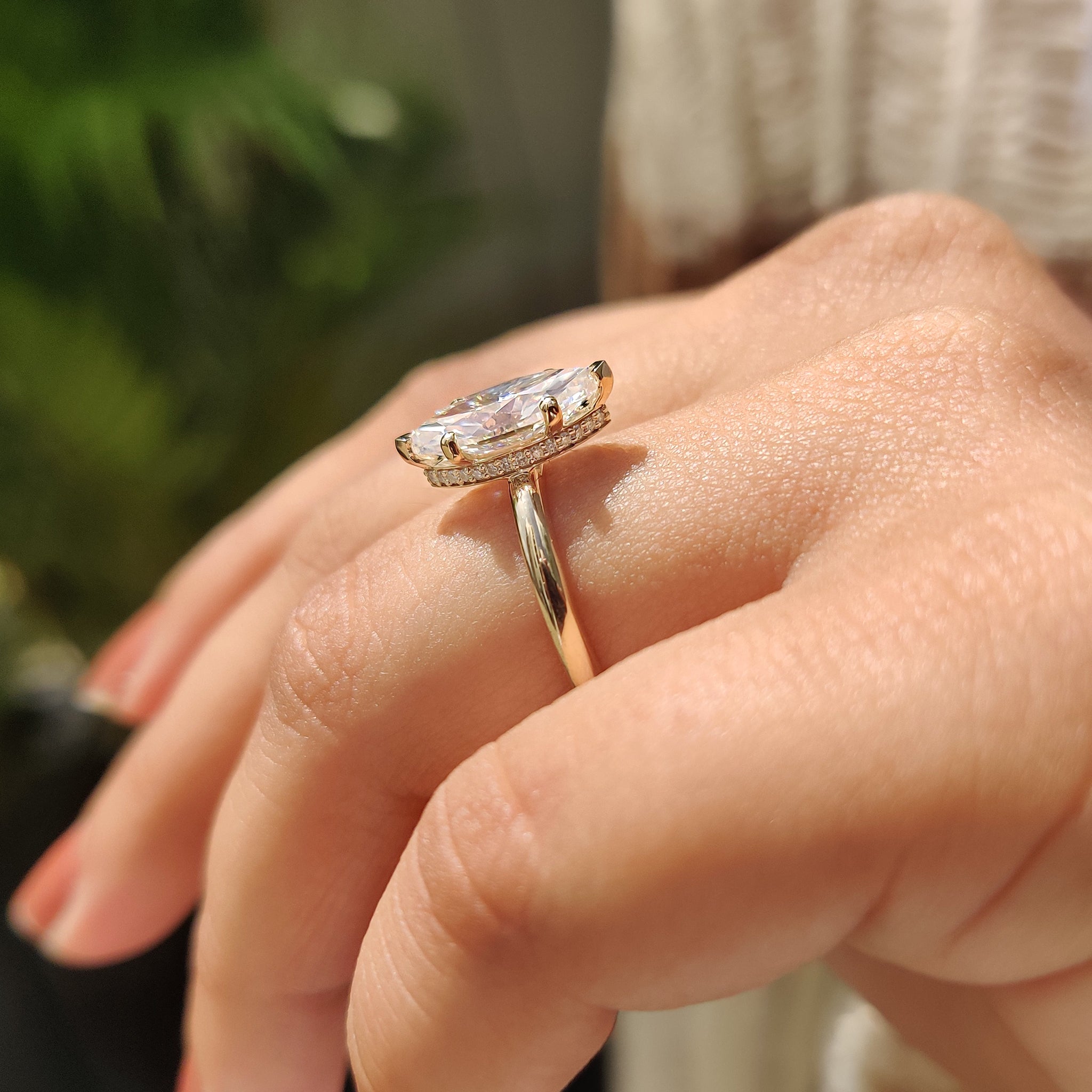 Yellow gold engagement ring in moissanite engagement ring.