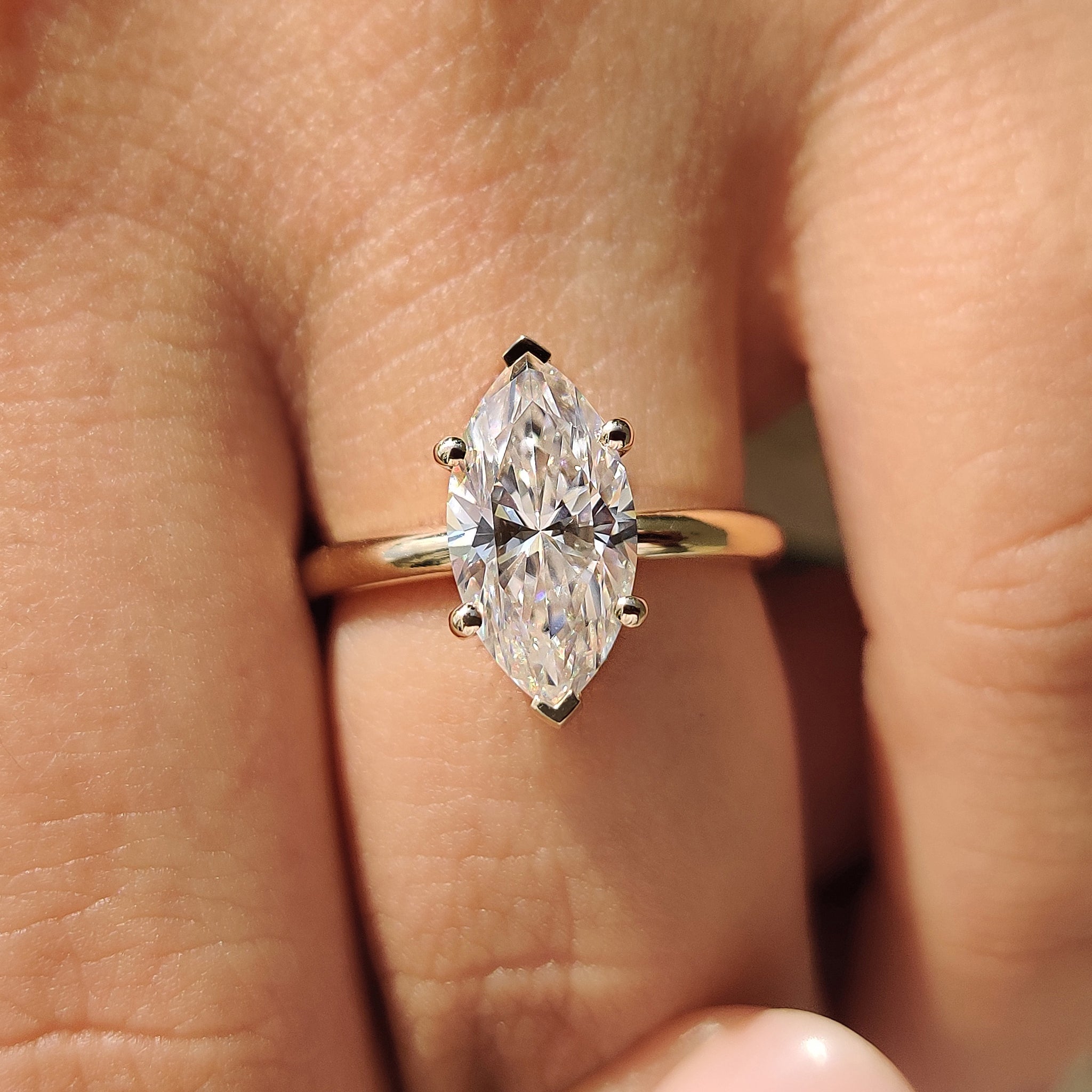 Carat diamonds engagement ring with marquise solitaire ring.