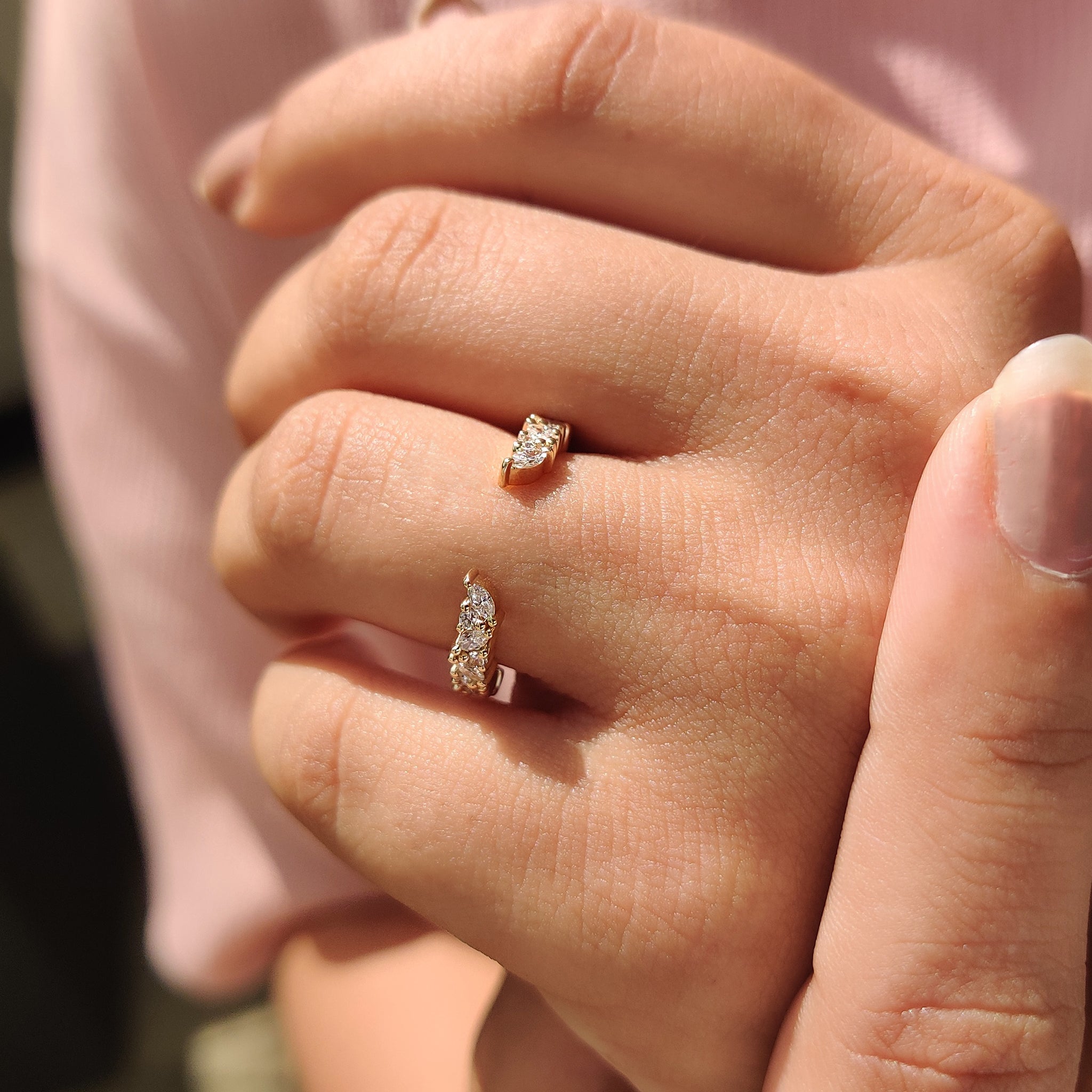 Yellow gold half eternity wedding band with marquise and round stones