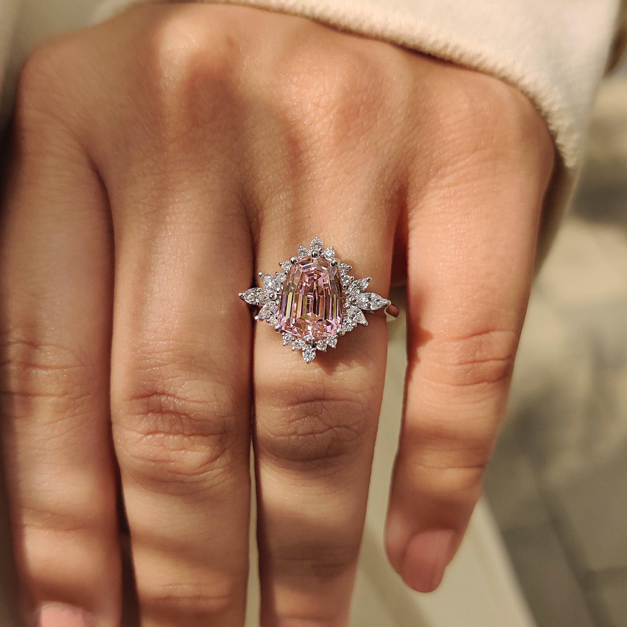 Gemstone engagement ring with cathedral setting.