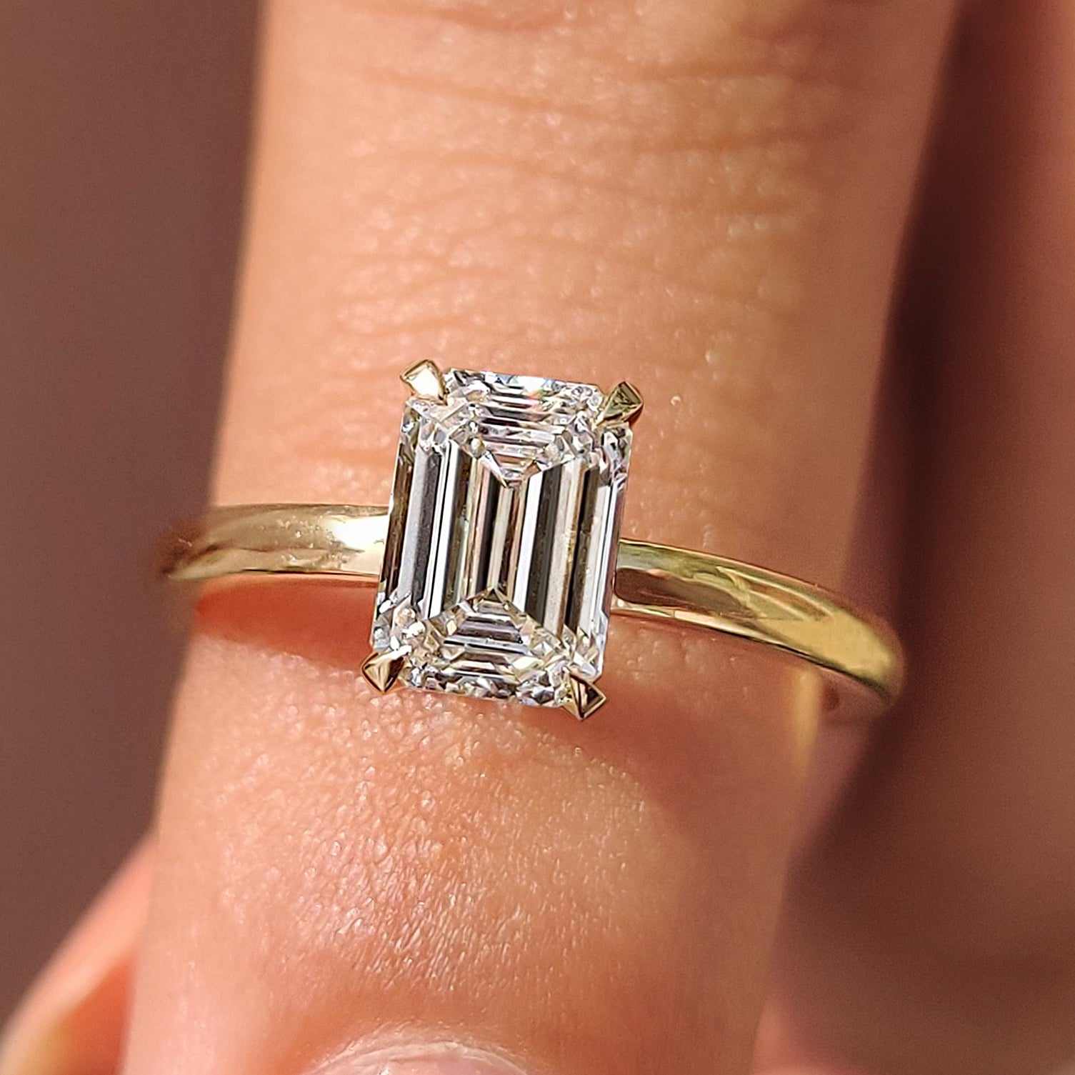 Emerald Cut Solitaire Ring In Basket Design