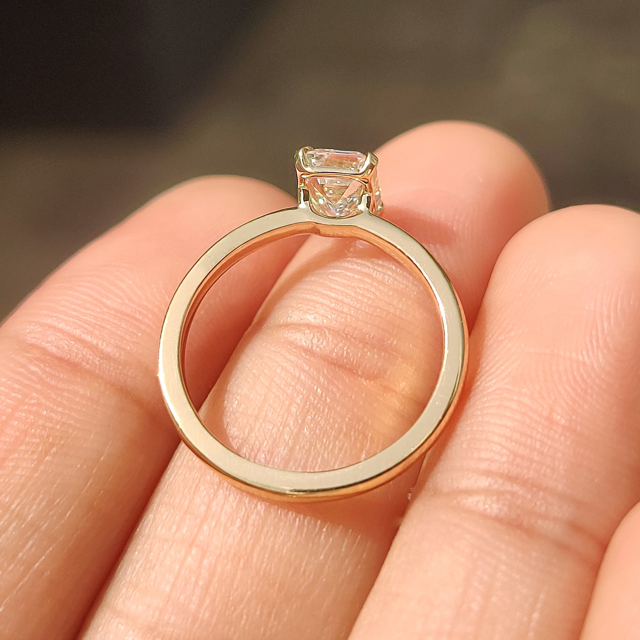 Yellow gold solitaire diamond ring