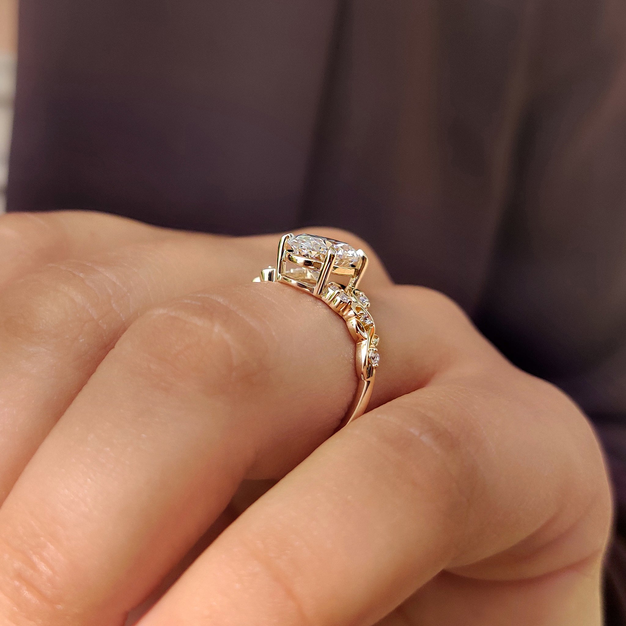 Nature inspired engagement ring with four claw prong setting.
