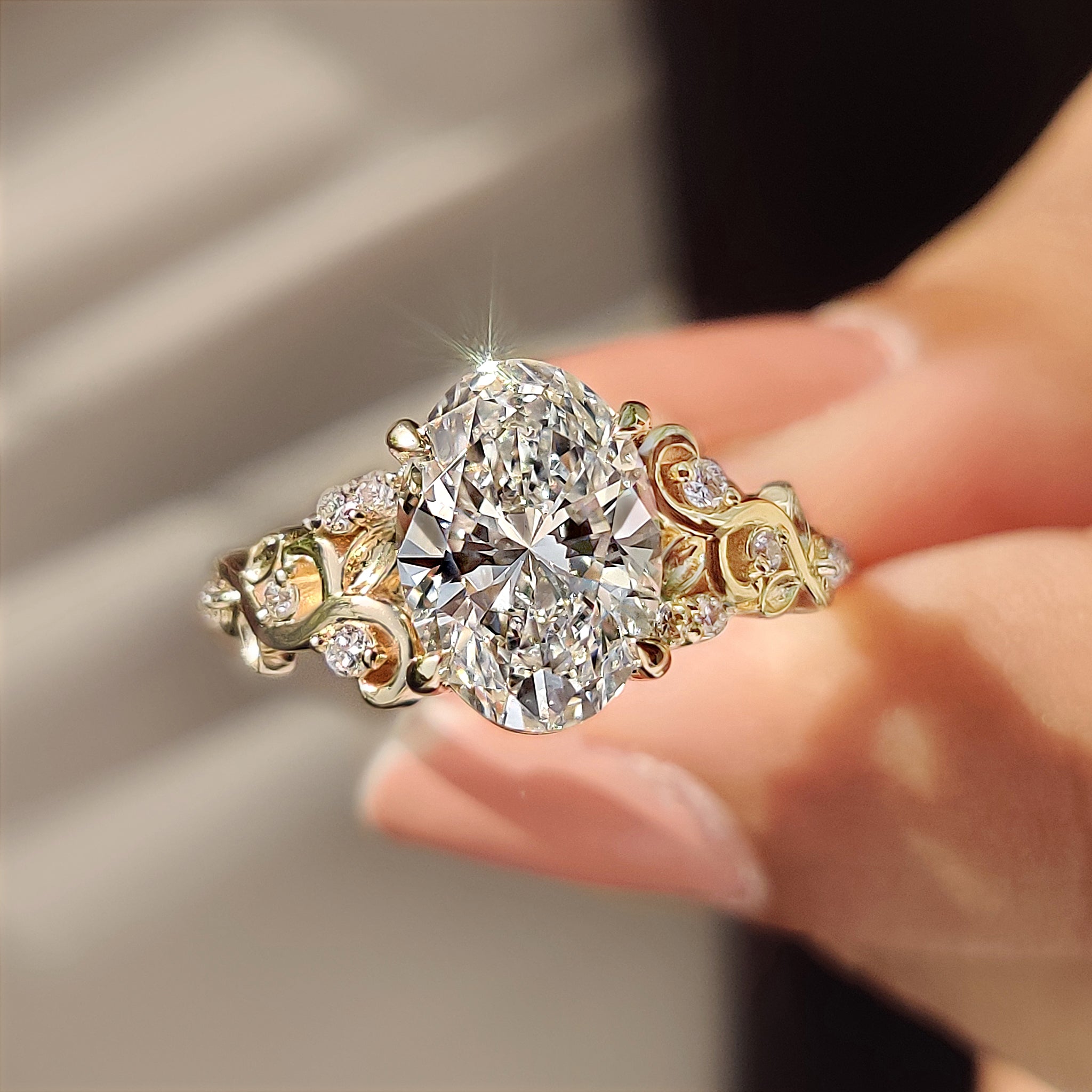 Oval shaped engagement ring with nature inspired engagement ring.
