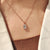 Solitaire diamond pendant with cushion cut diamond pendant.
