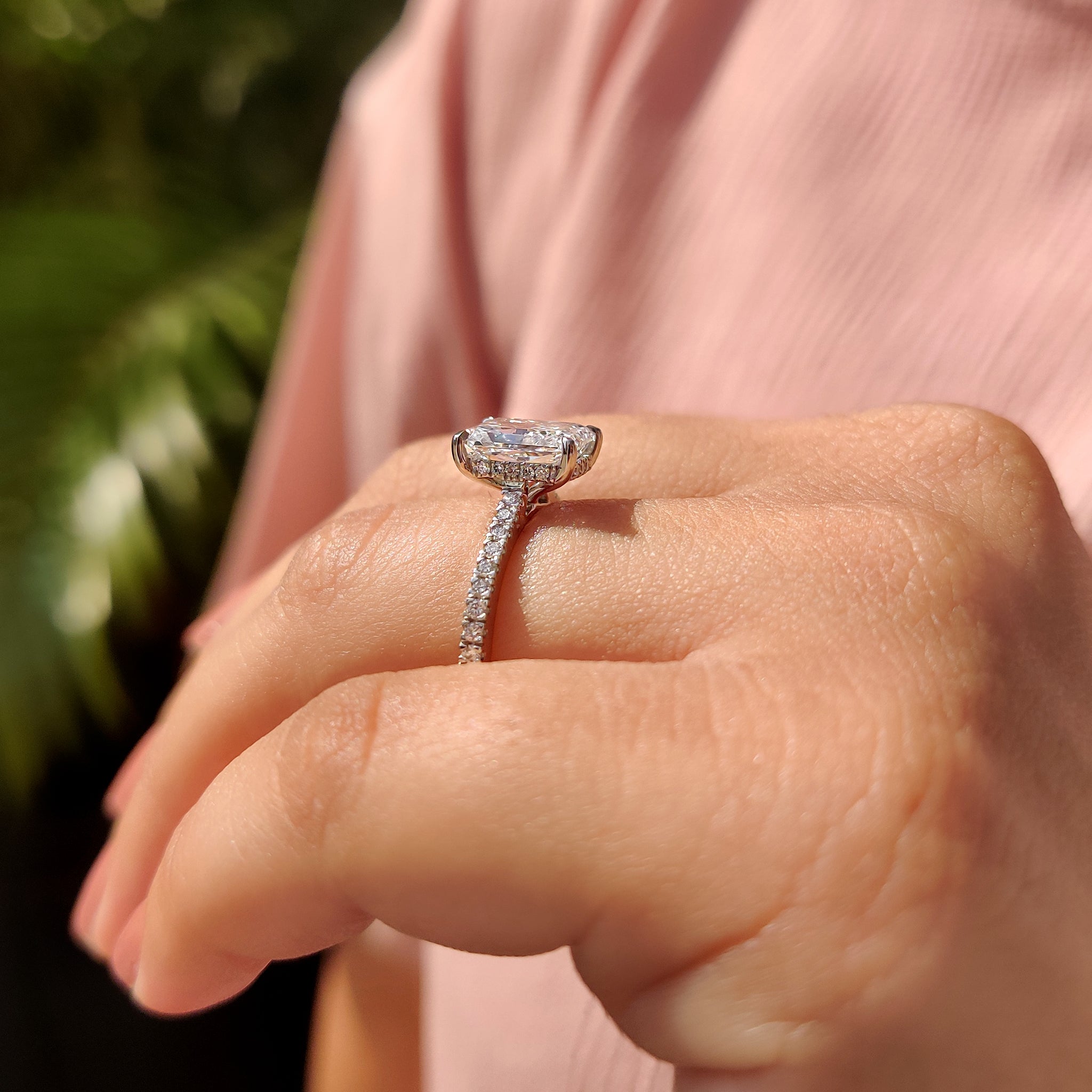 Diamond engagement ring in radiant cut design.
