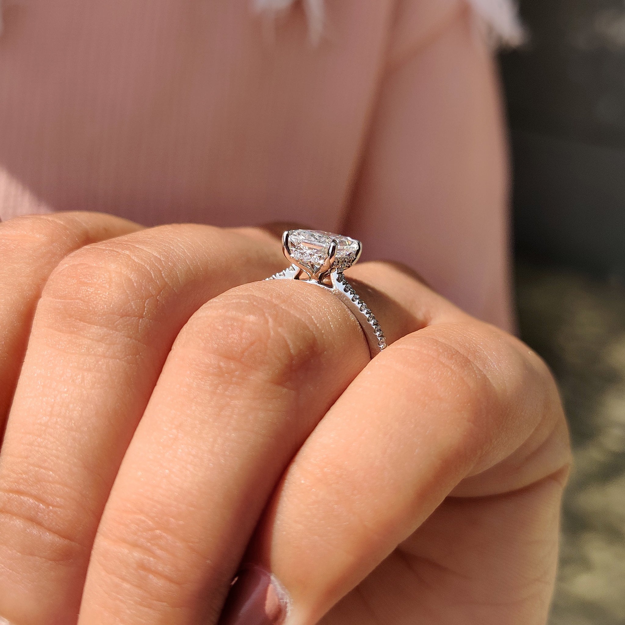 Buy diamond ring with radiant cut center stone.
