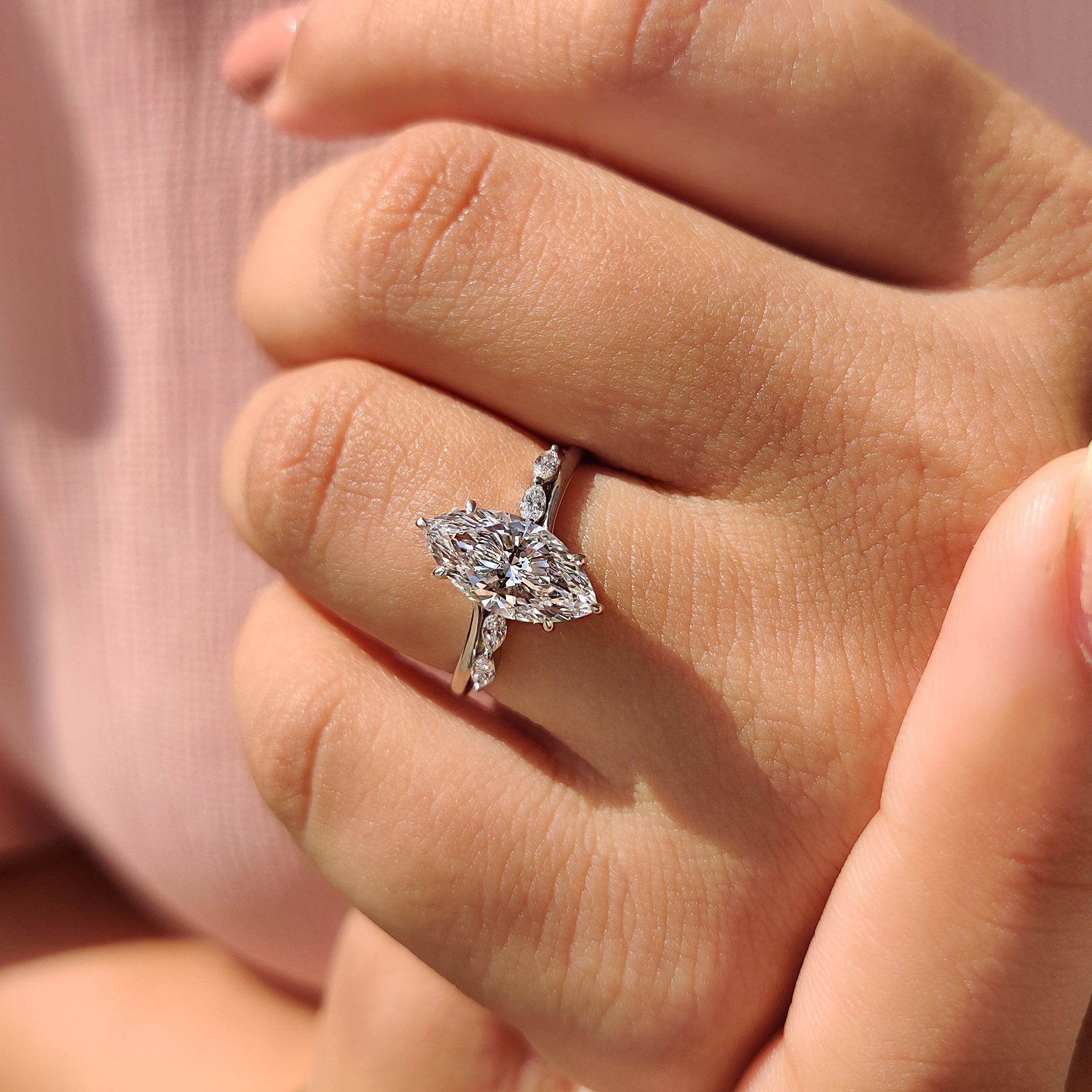 Cathedral setting ring in shared prong design.