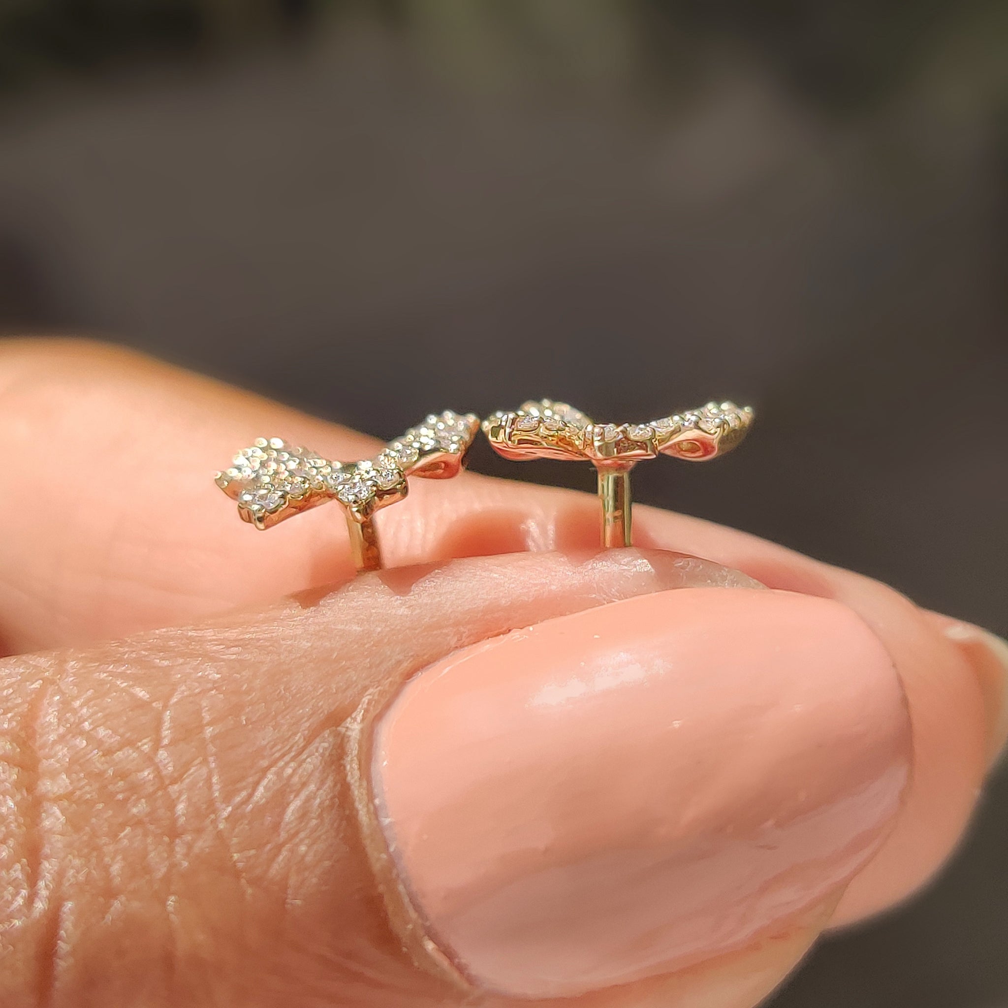 Lab grown diamond bow earrings crafted in yellow gold

