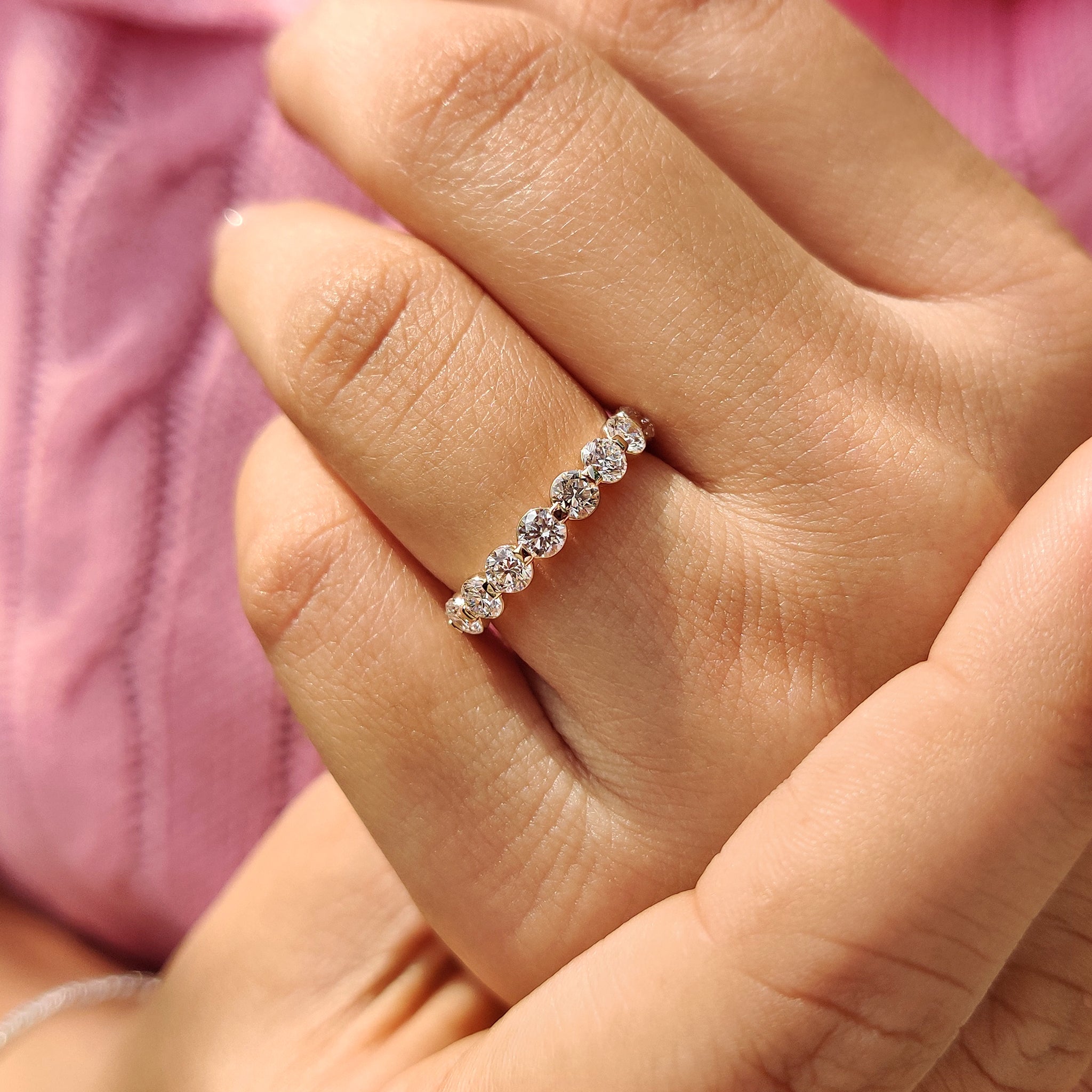 Carat Diamonds handmade diamond wedding band for women.
