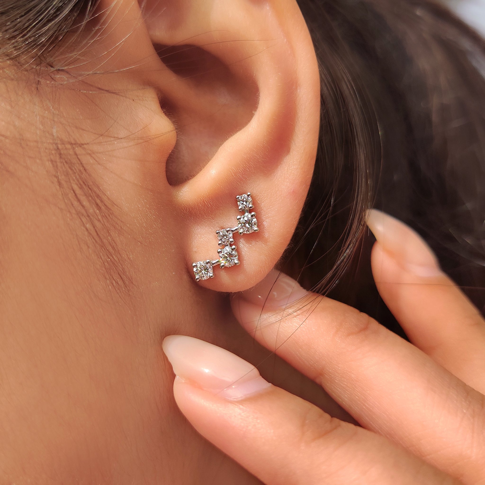 White gold round diamond stud earrings with secure screw back closure
