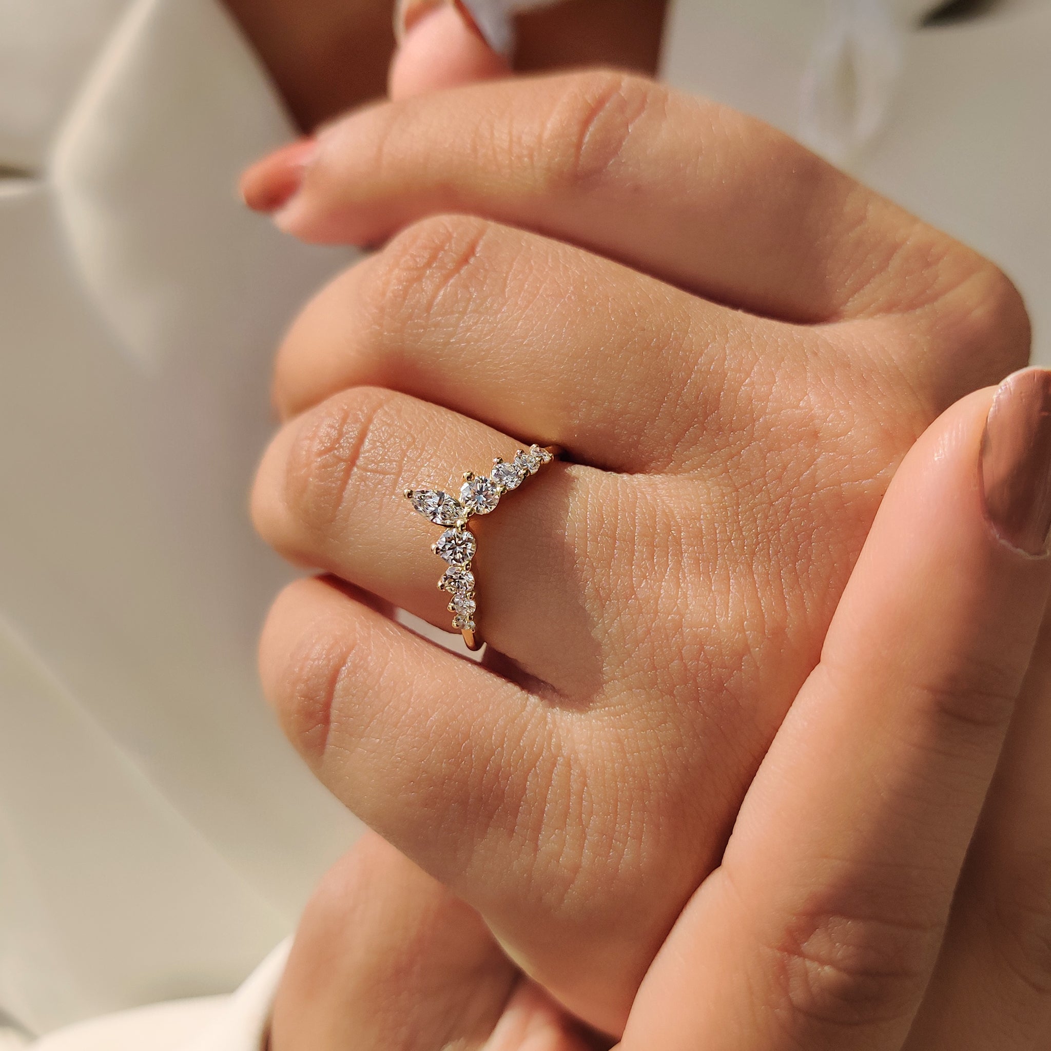 Carat diamonds wedding band with seven stone and curved design
