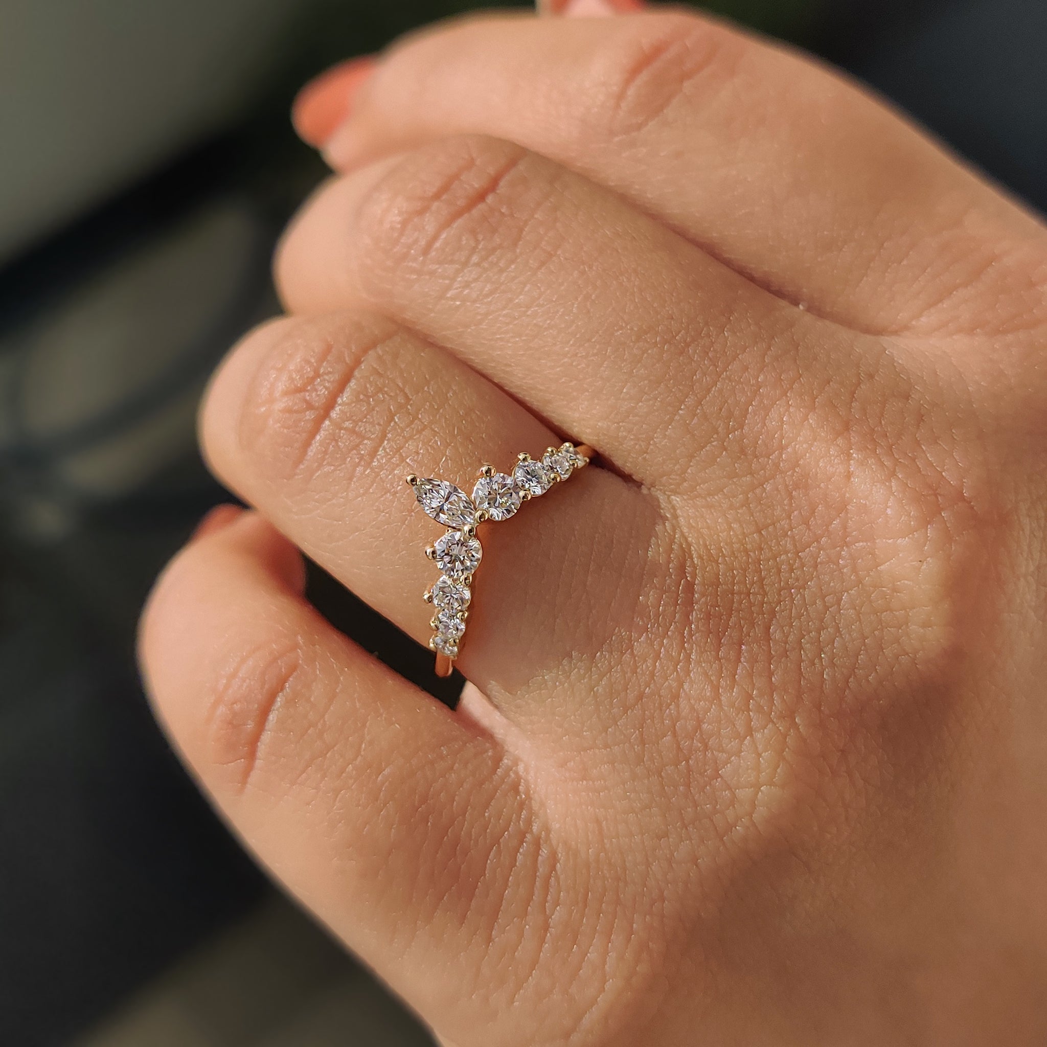 Handmade jewelry wedding band with stackable design and marquise cut center
