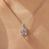 Asscher cut lab diamond pendant with a four claw prong design.