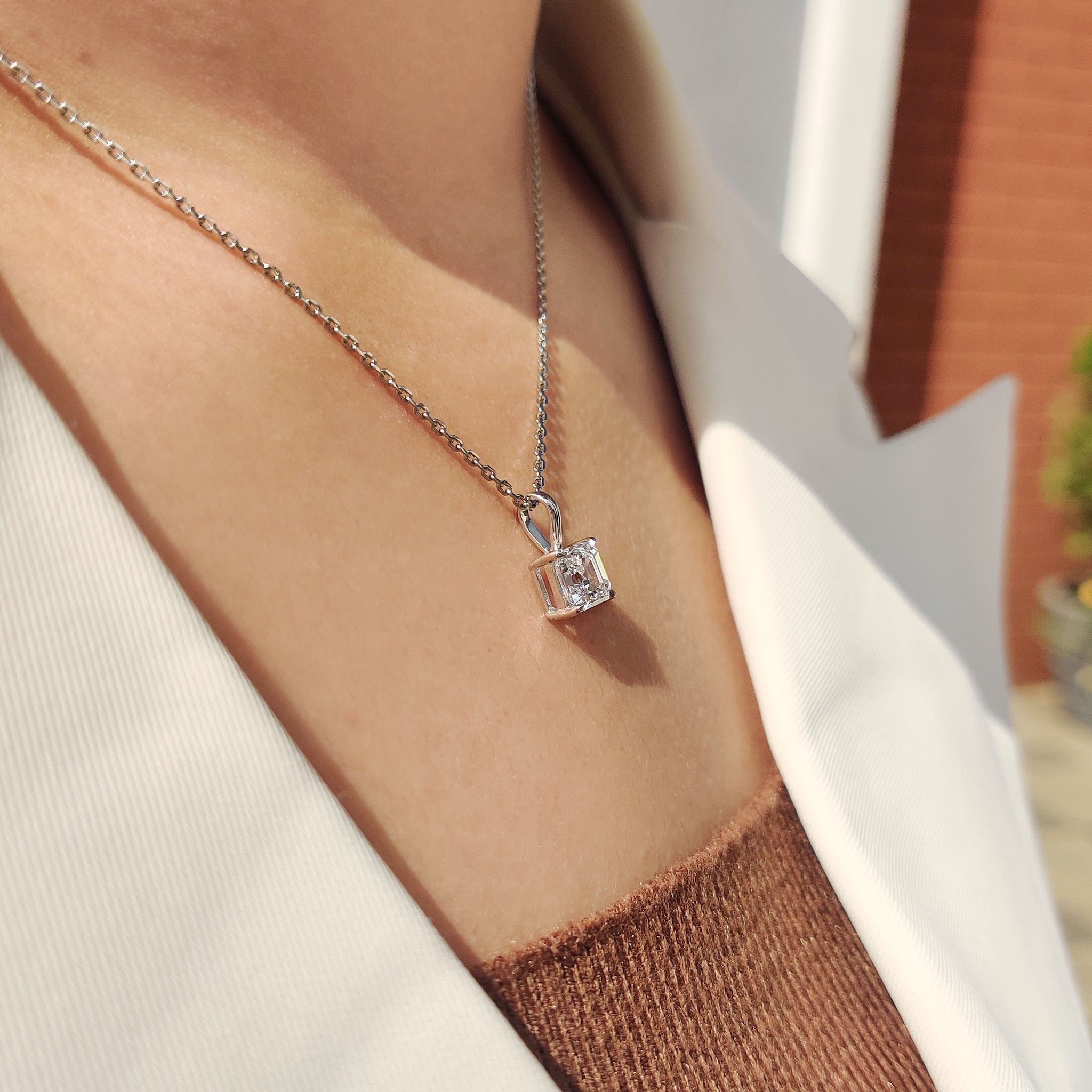 Handmade white gold pendant with an Asscher cut lab grown diamond
