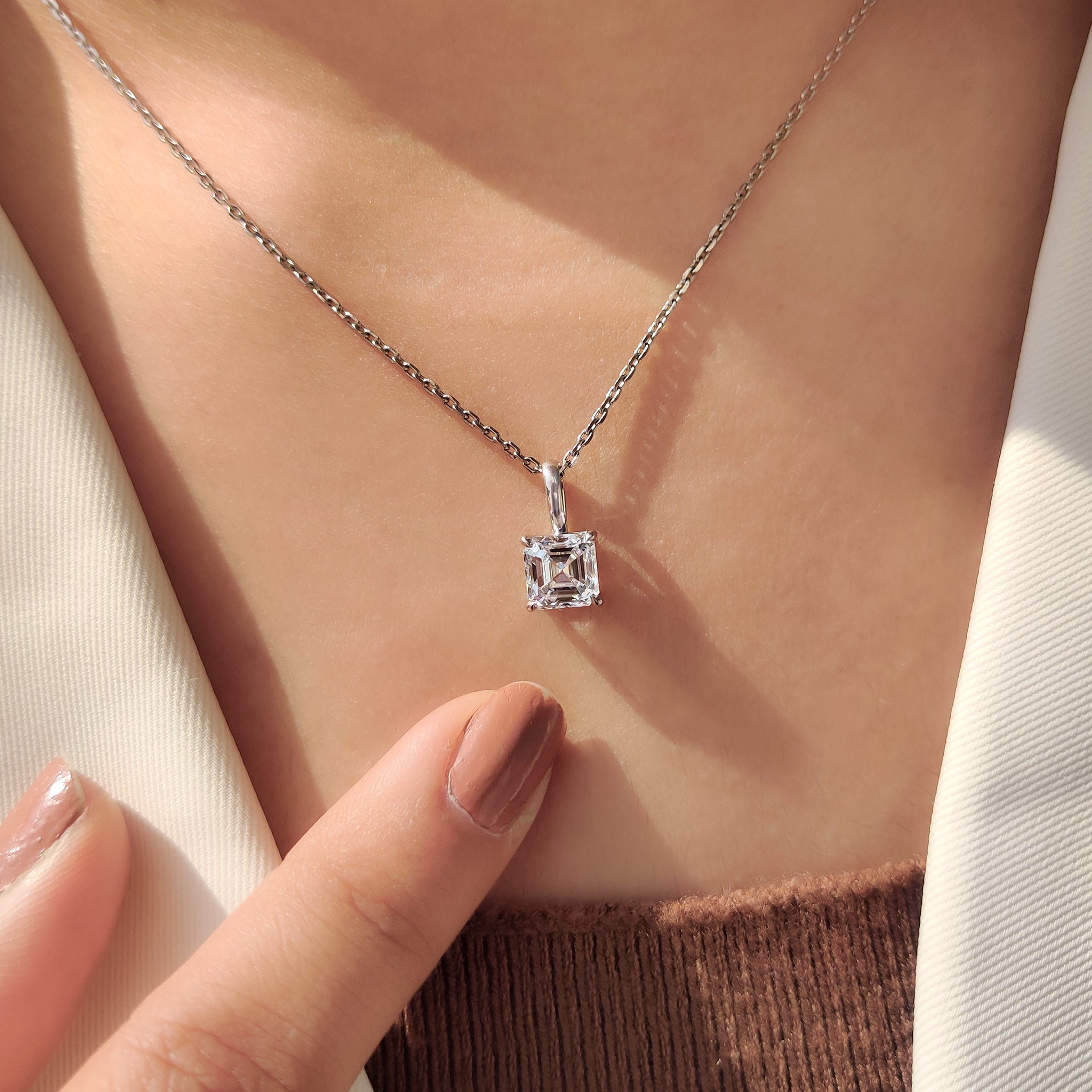 White gold Asscher cut diamond pendant handcrafted by Carat Diamonds
