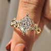 Dutch Marquise Engagement Ring with marquise and round side stone.