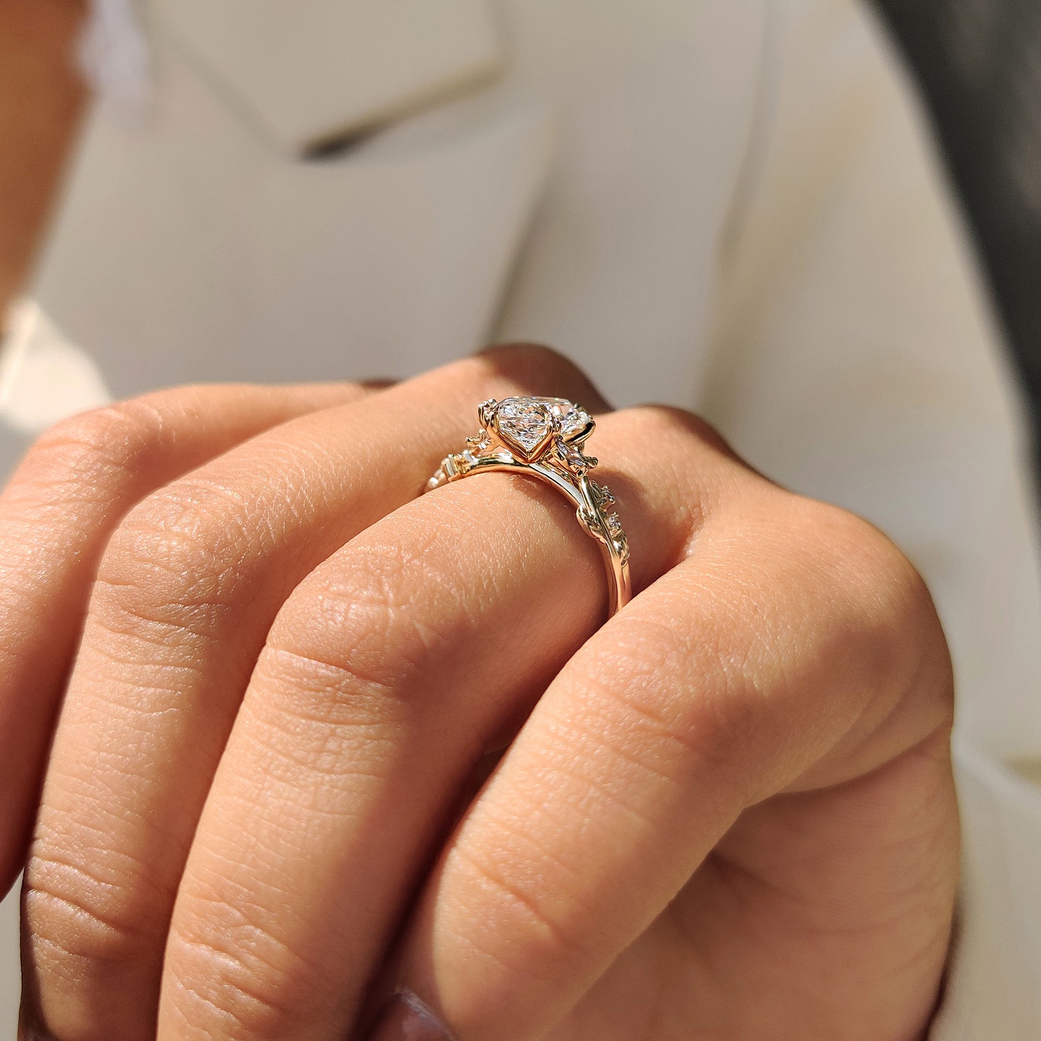 Diamond engagement ring on handmade jewelry.