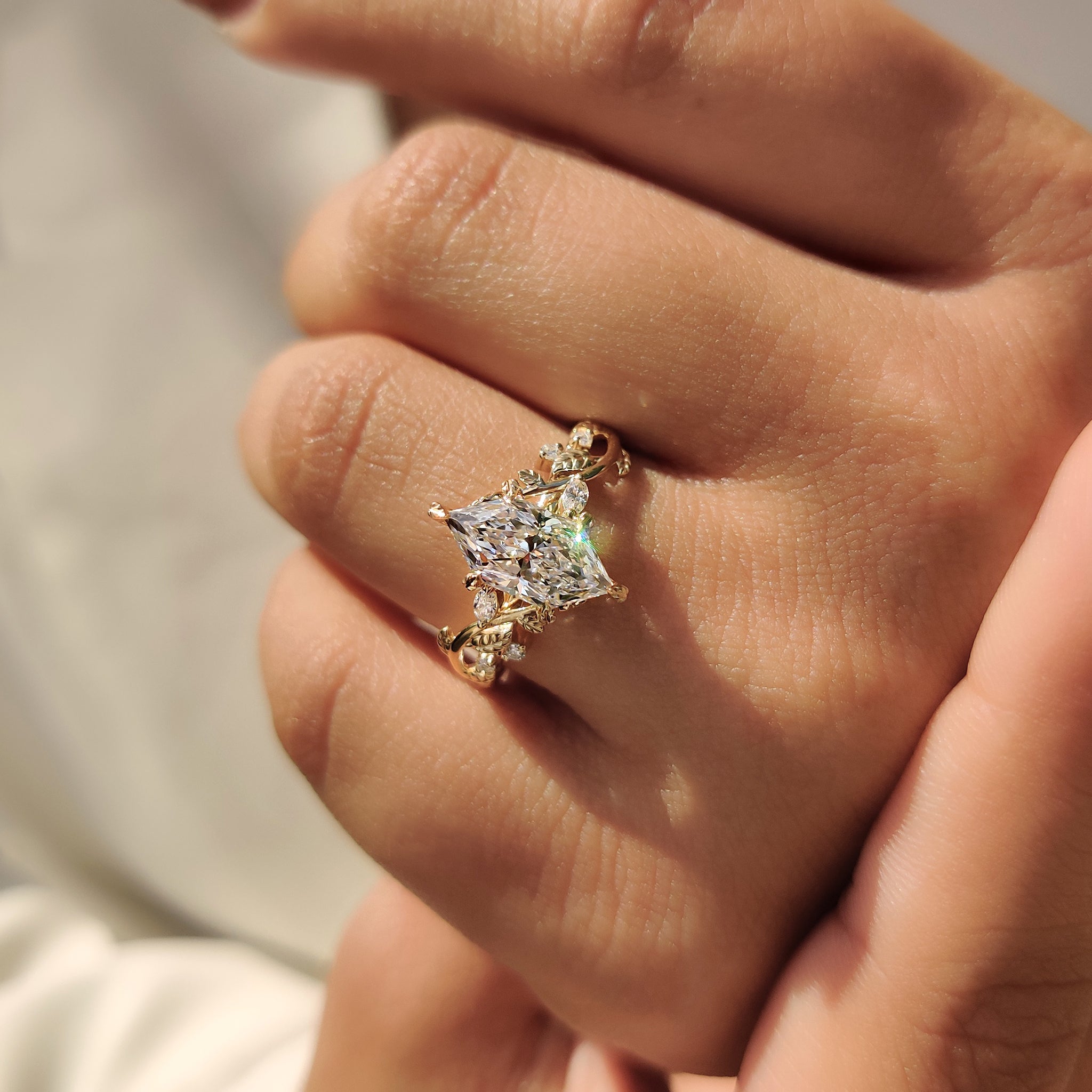 Cluster setting ring with yellow gold engagement ring.