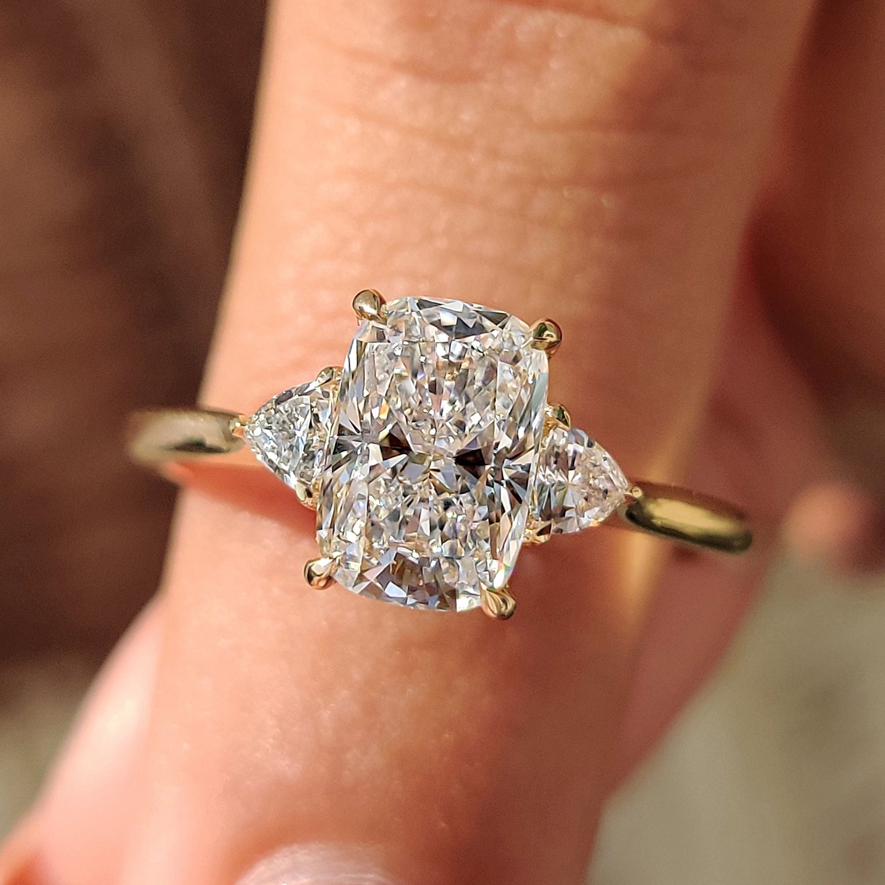 Elongated Cushion Cut Engagement Ring With Cathedral Setting